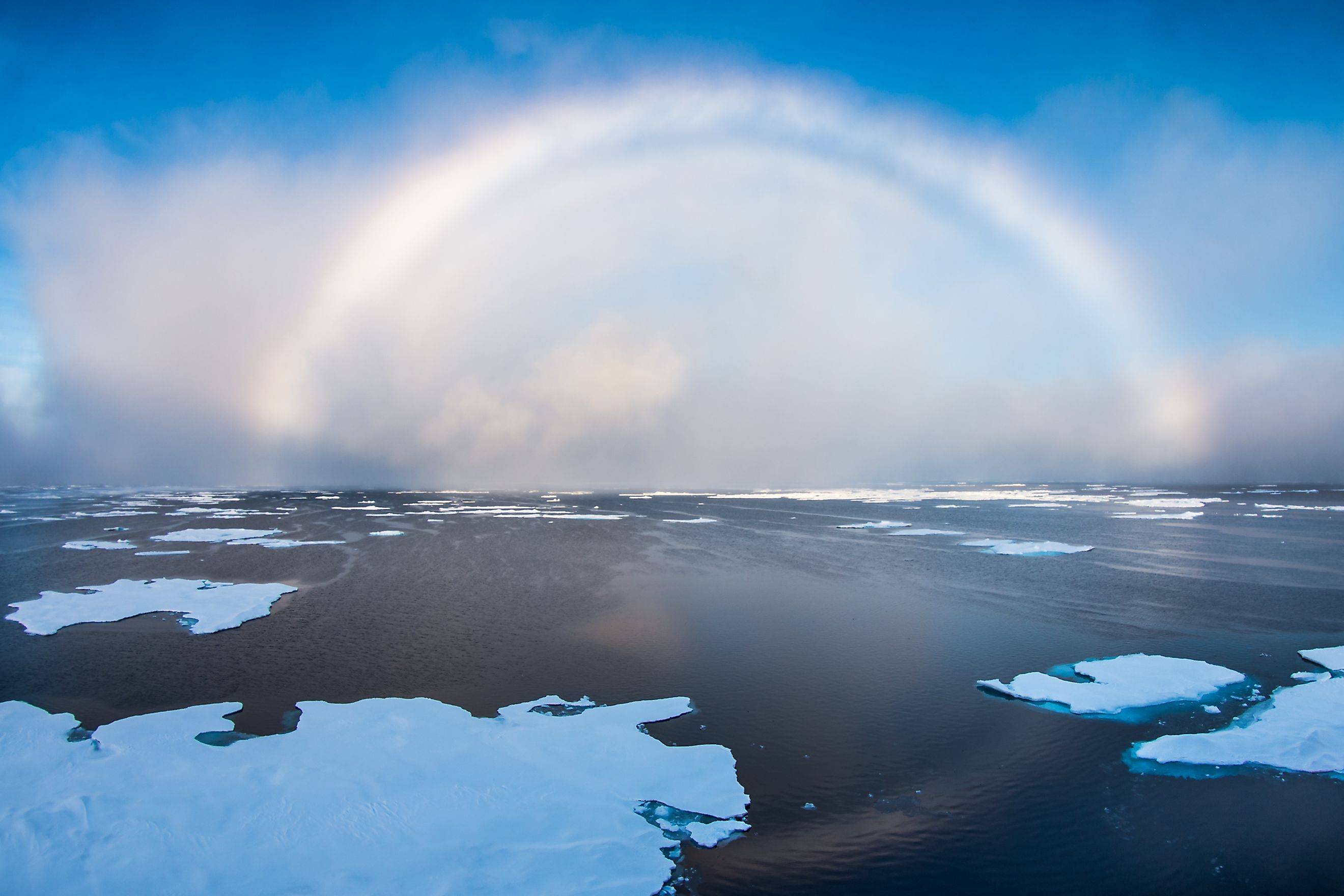 A white rainbow, a rare meteorological phenomenon, over the East Siberian Sea. 