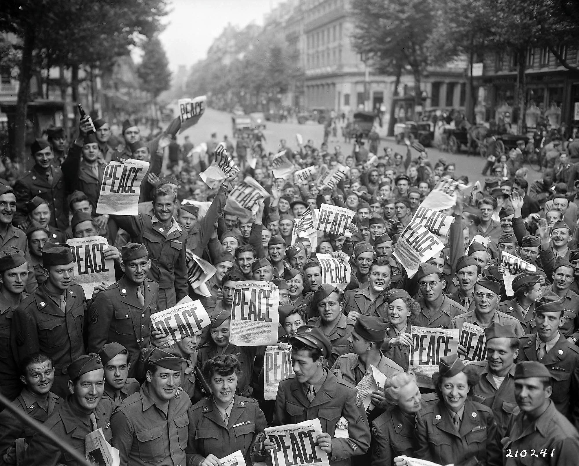 Soldiers of the Allied front celebrate their victory in Paris, France post World War II.