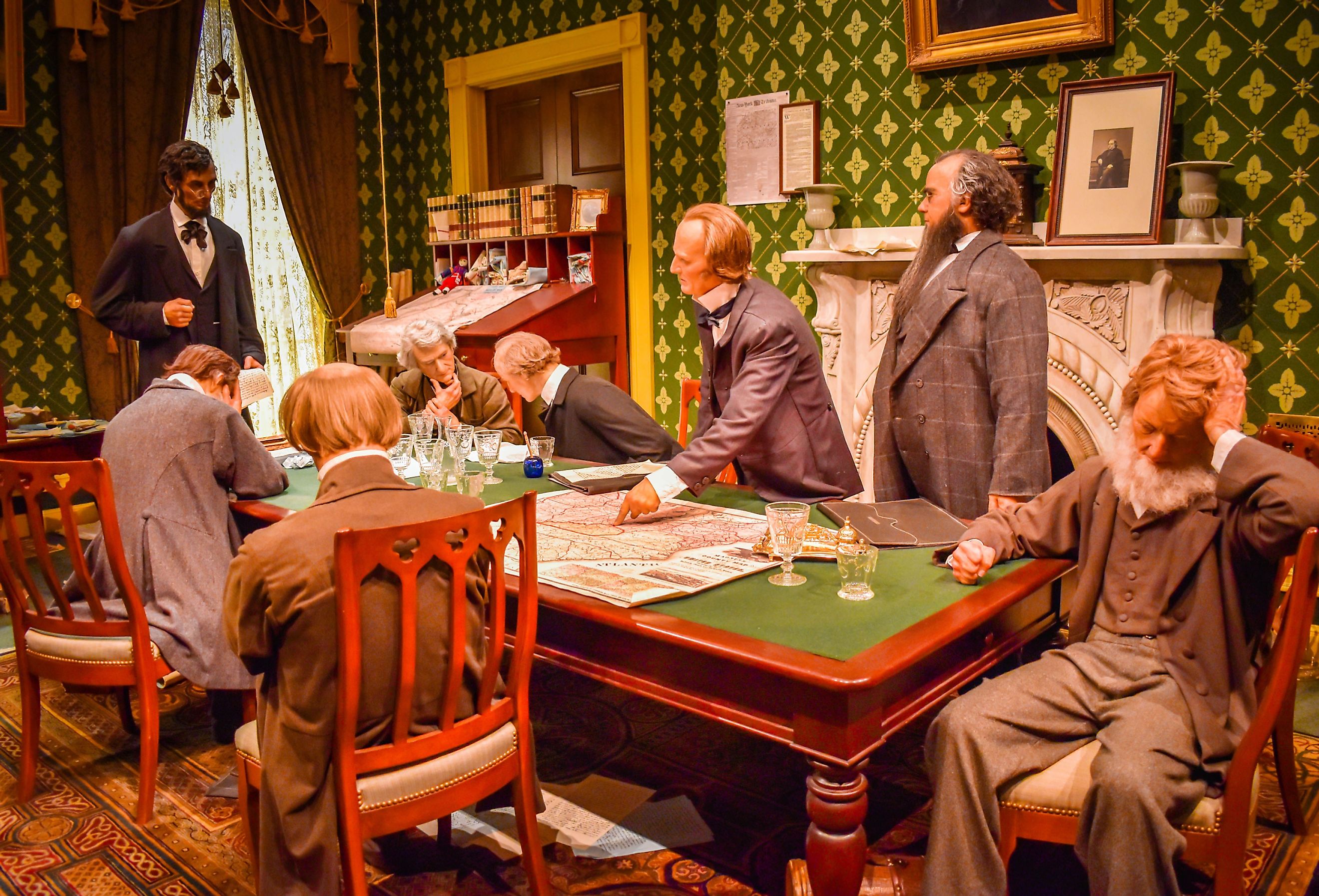 A depiction of President Abraham Lincoln convening his Cabinet to share his draft of the Emancipation Proclamation. Image credit Brett Welcher via Shutterstock