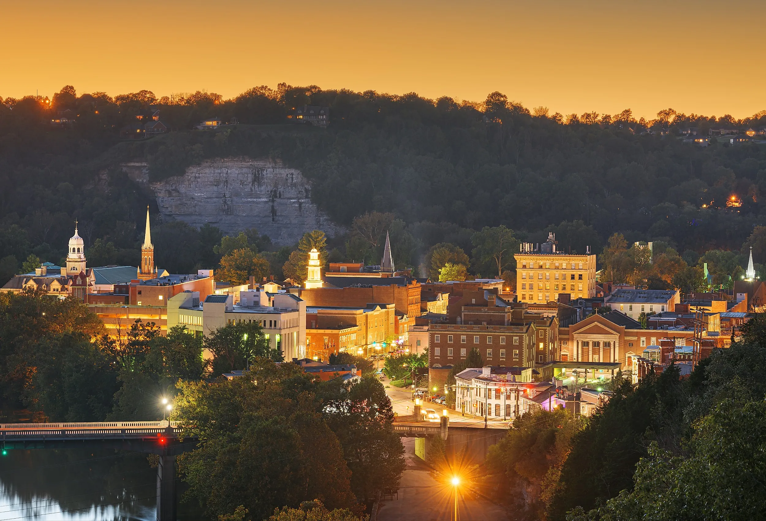 Frankfort, Kentucky, USA town skyline on the Kentucky River at dusk.