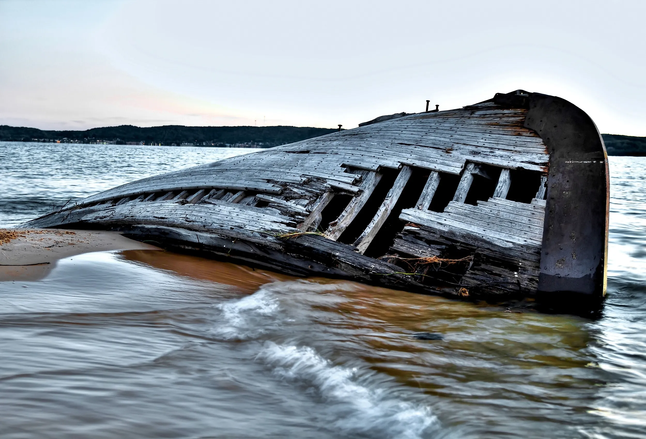 Beached shipwreck on Lake Superior coast. 