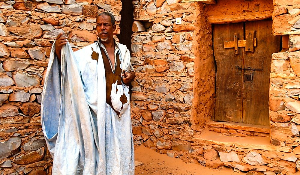 Mauritanian man wearing traditional boubou or derraa. Editorial credit: Homo Cosmicos / Shutterstock.com