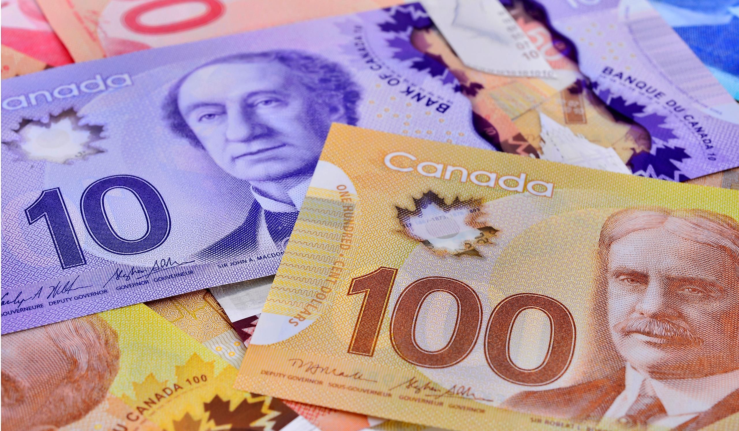 Canadian Dollars bills, concept of business and finance. Editorial credit: i viewfinder / Shutterstock.com