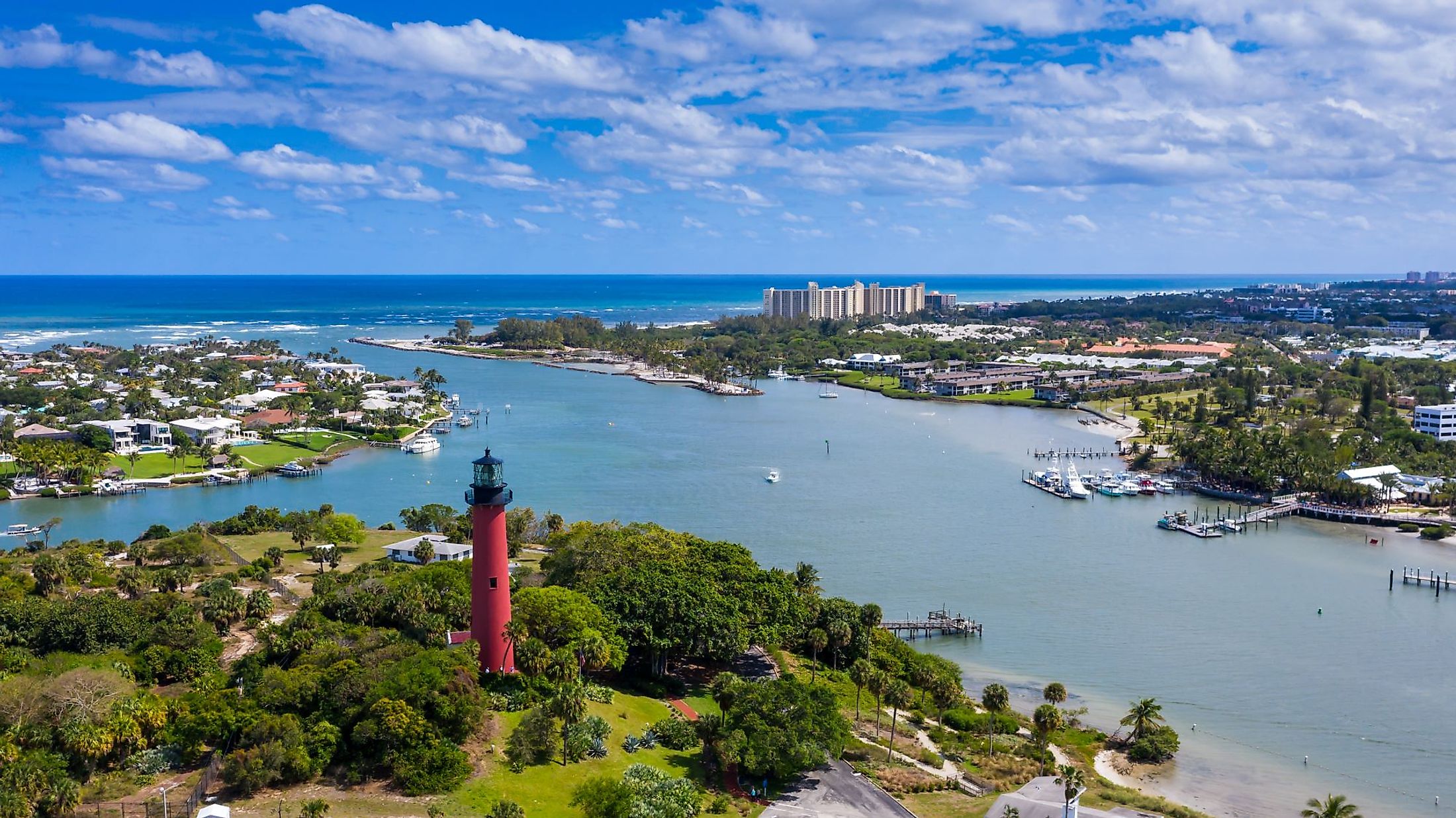 On a hill overlooking the Loxahatchee River, the red Jupiter Inlet Lighthouse offers panoramic views. 