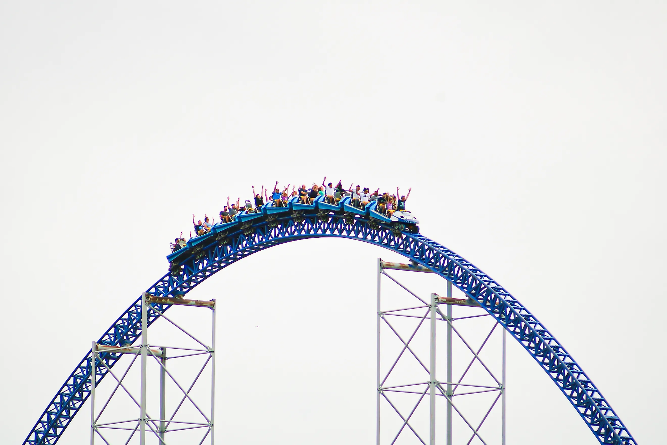 The train of Millennium Force crests a hill at Cedar Point in Sandusky, Ohio. Via Shutterstock / CJDPhotos