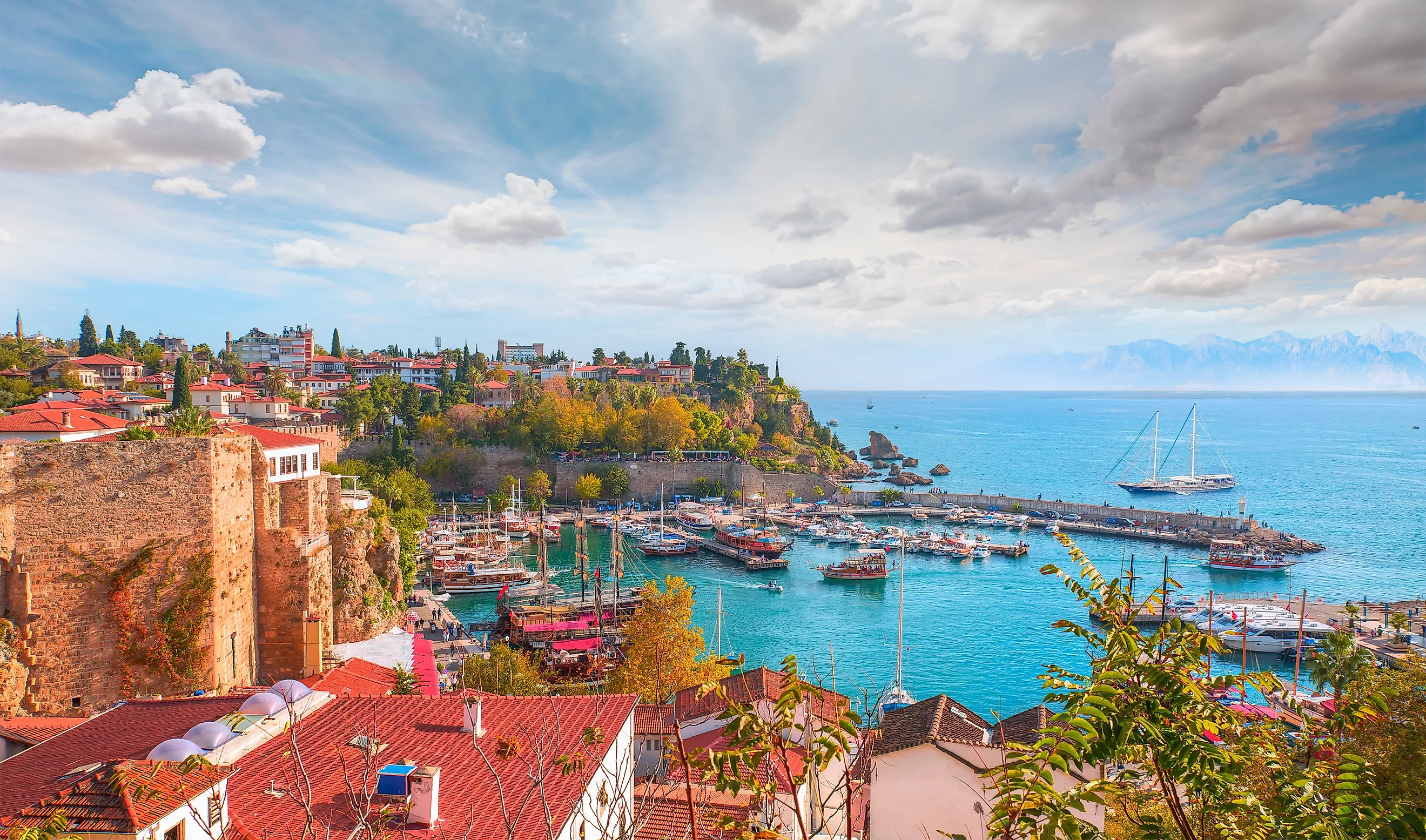 Aerial view of Antalya old town or harbour (Kaleici), Bay with ships and boats in summer - Antalya, Turkey 