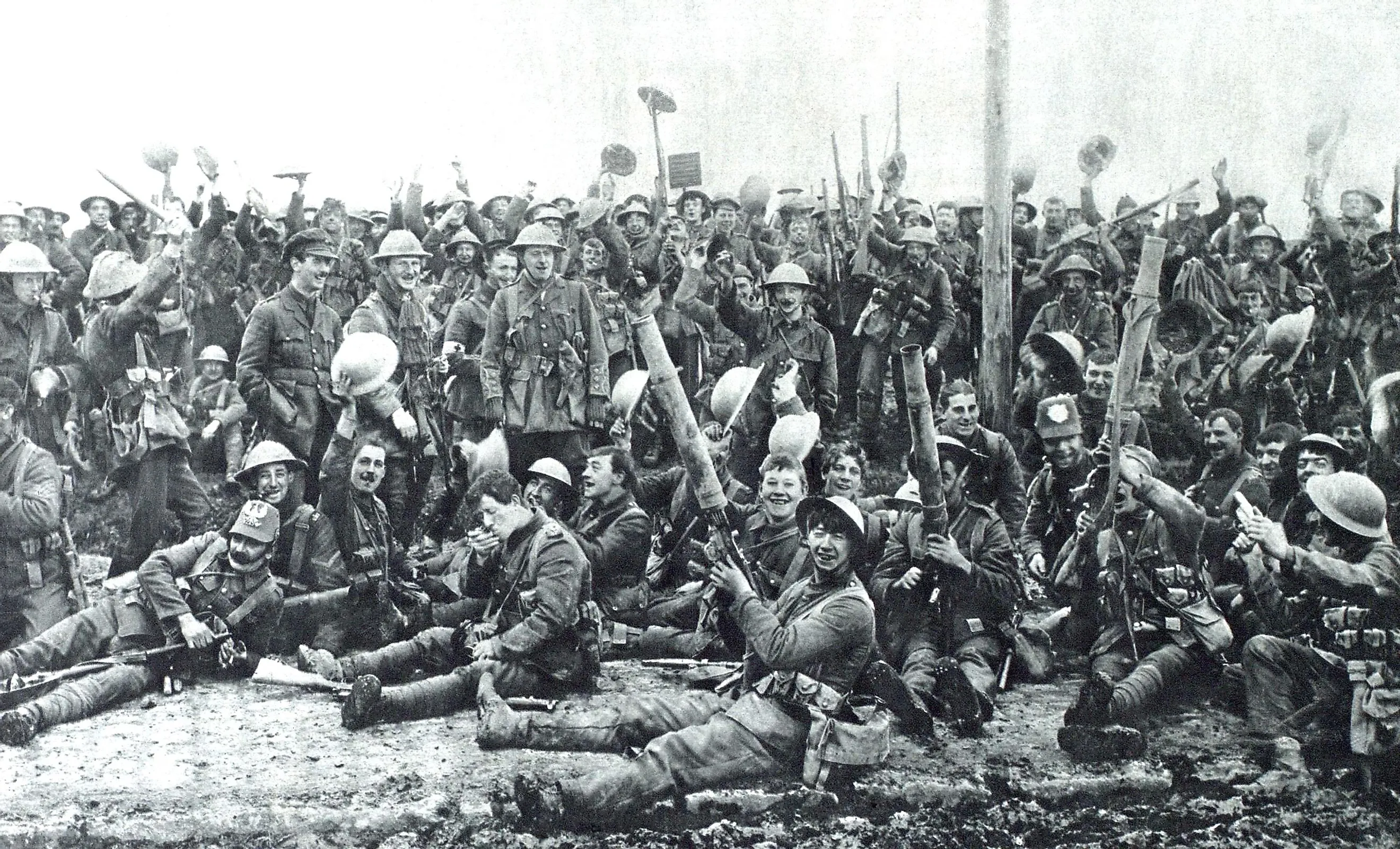 British soldiers celebrating their capture of German trenches at St. Eloi, near Ypres, Belgium. 