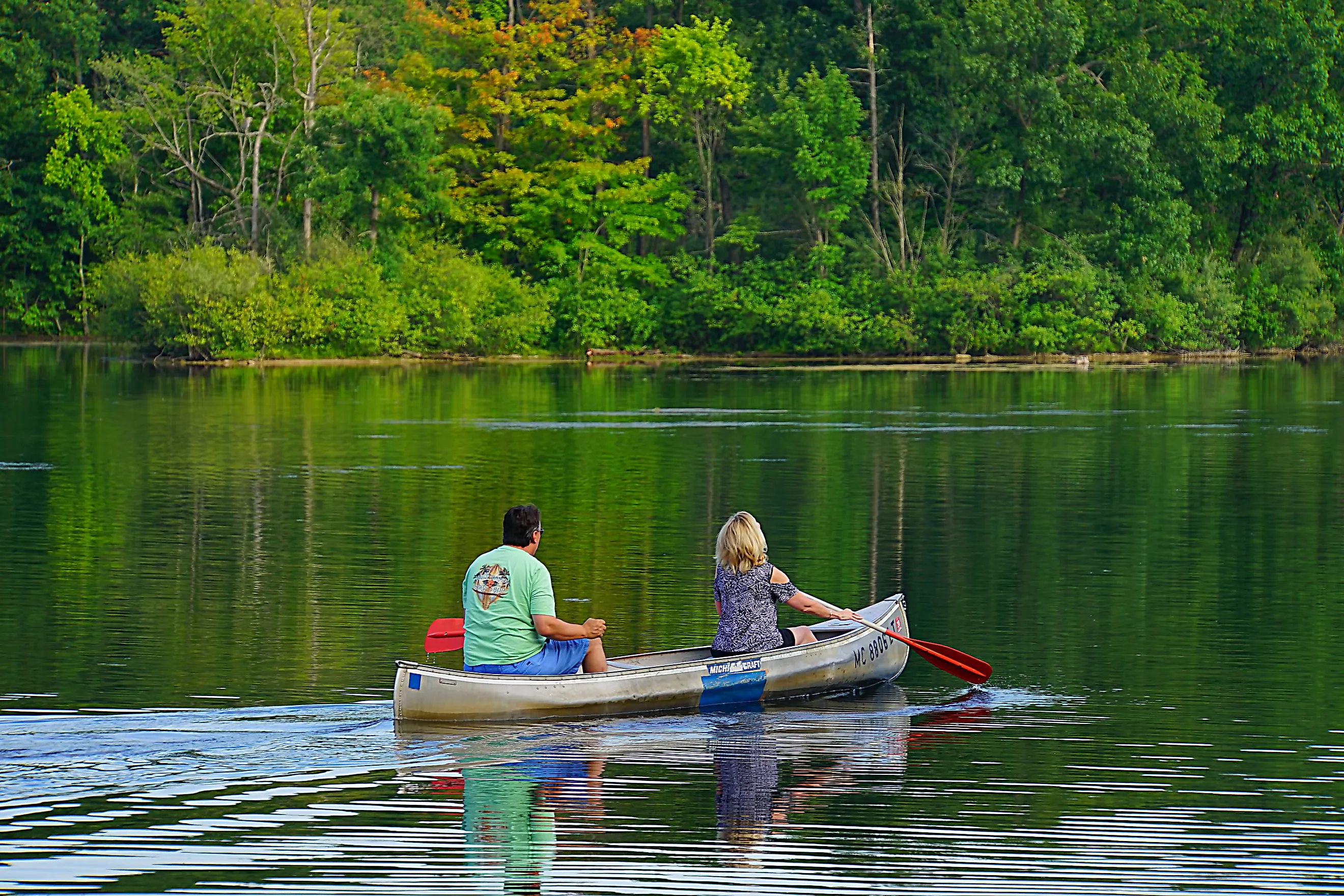 A couple canoeing in Metamora, Michigan, just an hour from Detroit. Editorial Credit: Fsendek, Shutterstock.com