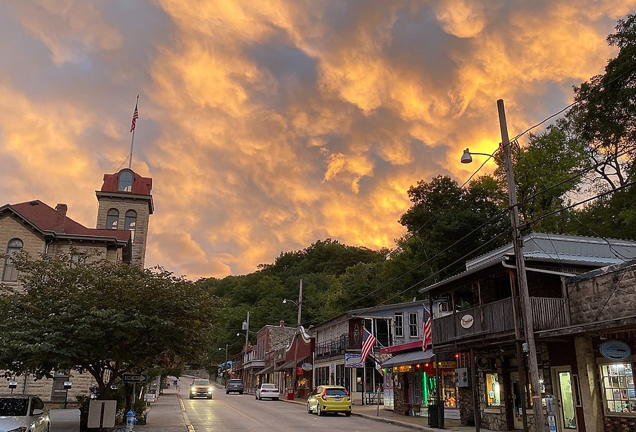 A beautiful sky over Main Street in downtown Eureka Springs. Image credit EurekaSpringsAR via Creative Commons