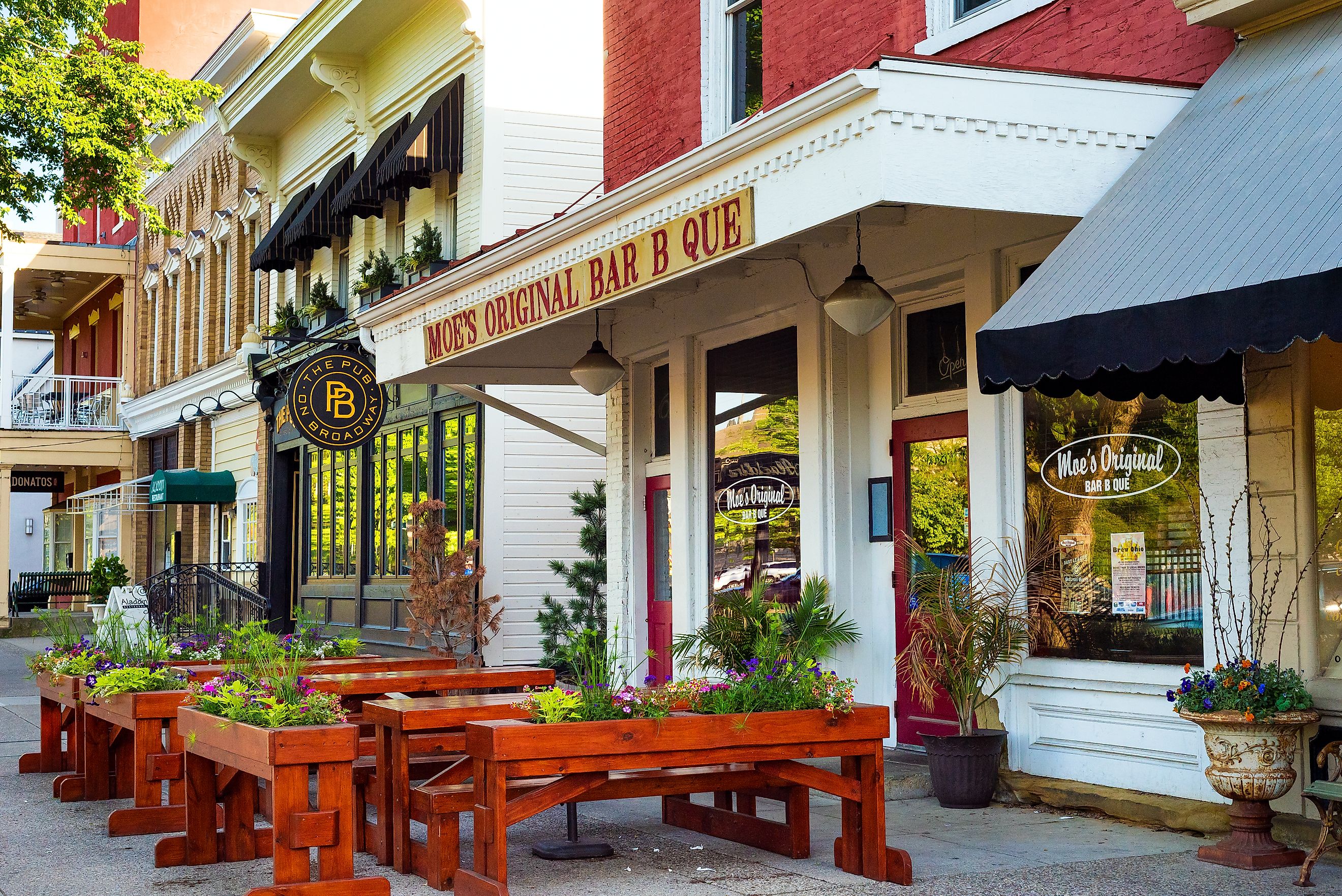 GRANVILLE, OH - MAY 15, 2017: Sidewalk seating is a feature at Moe's Bar B Que and other establishments on the main street of this charming east-central Ohio village.