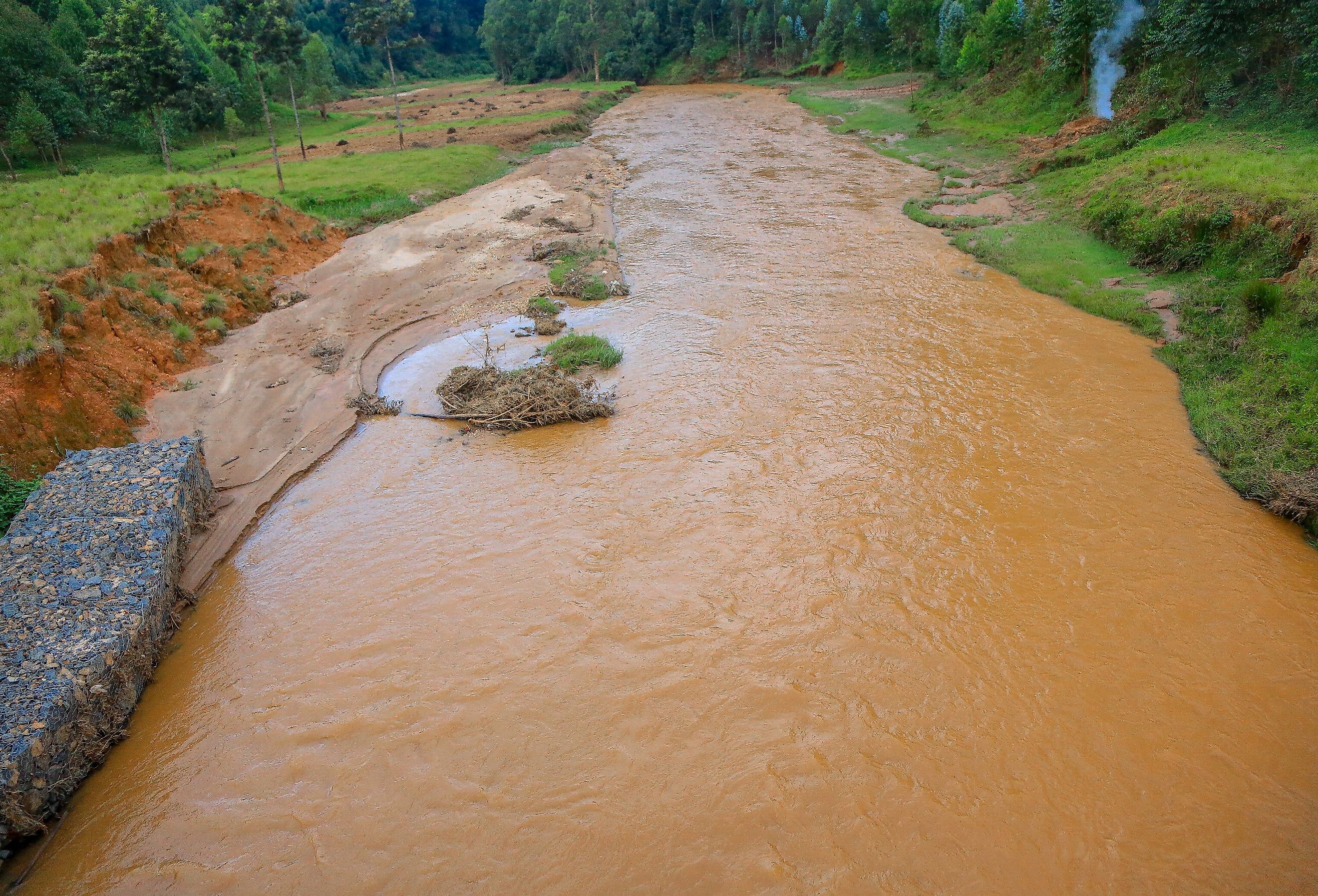 Akanyura River. Because of soil erosion some water bodies in the vicinity of urban areas are extremely polluted.