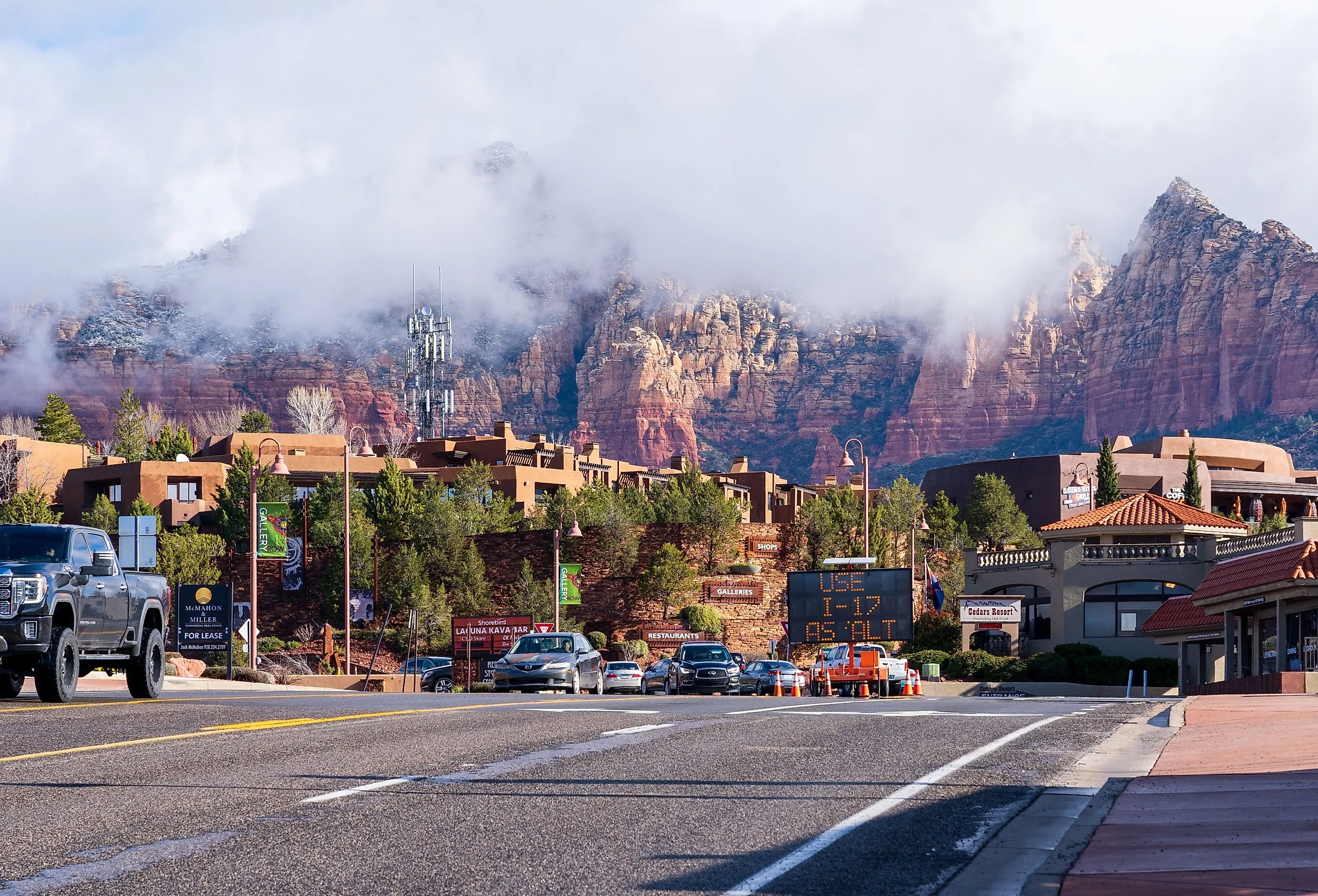 Downtown Sedona with mountains in the background. Image credit Red Lemon via Shutterstock.