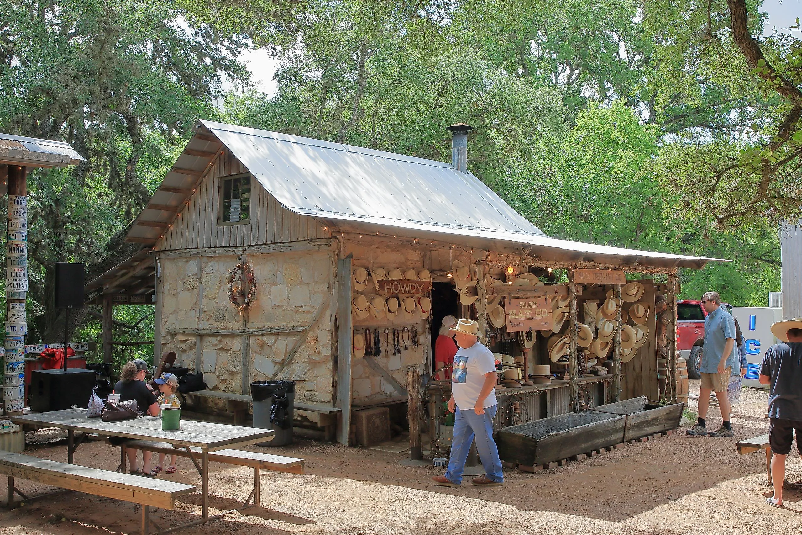 An external view of the open-air Snail Creek Hat Company in Luckenbach, Texas. via JustPixs