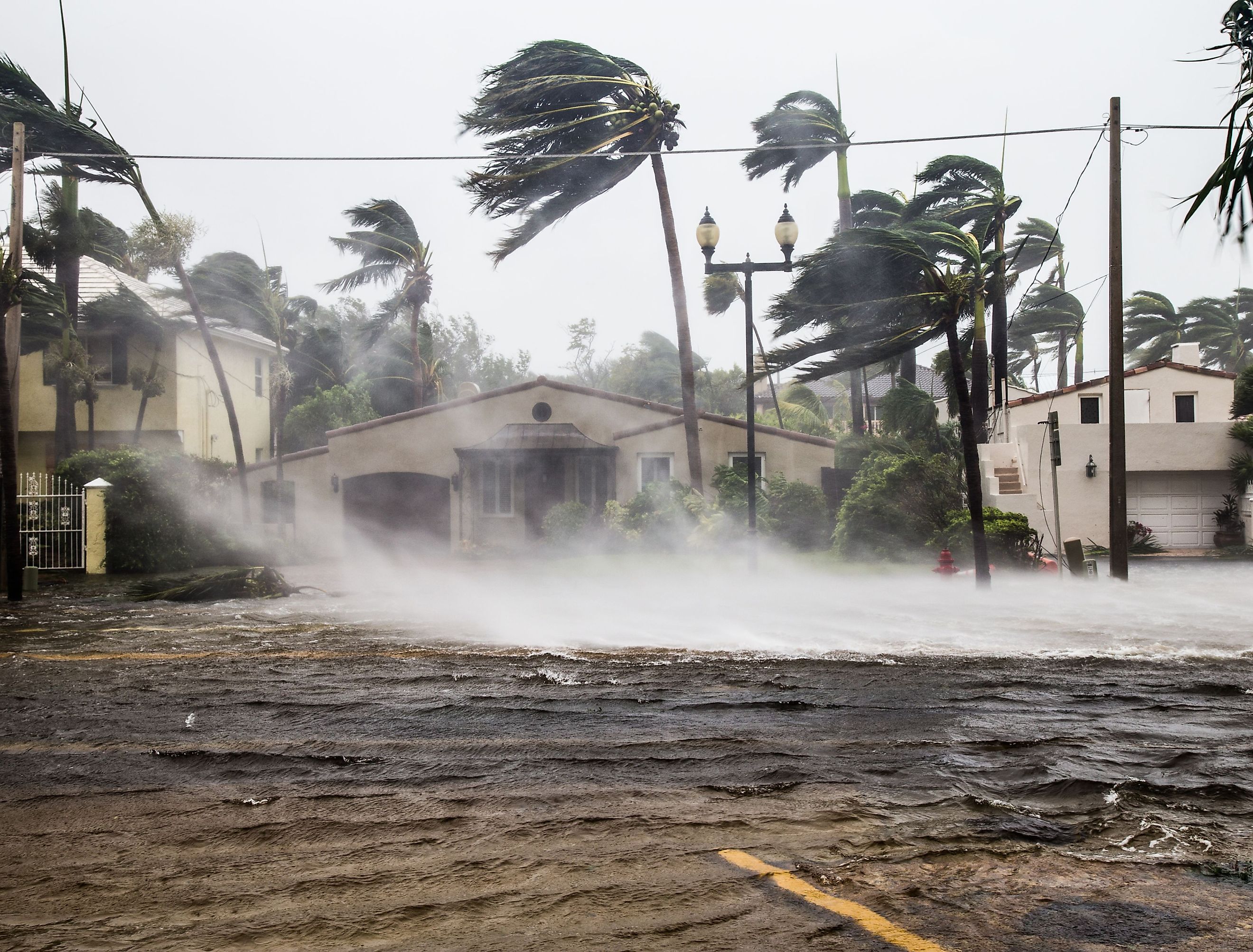 A flooded street after catastrophic Hurricane Irma hit Fort Lauderdale, FL. Image credit FotoKina via shutterstock