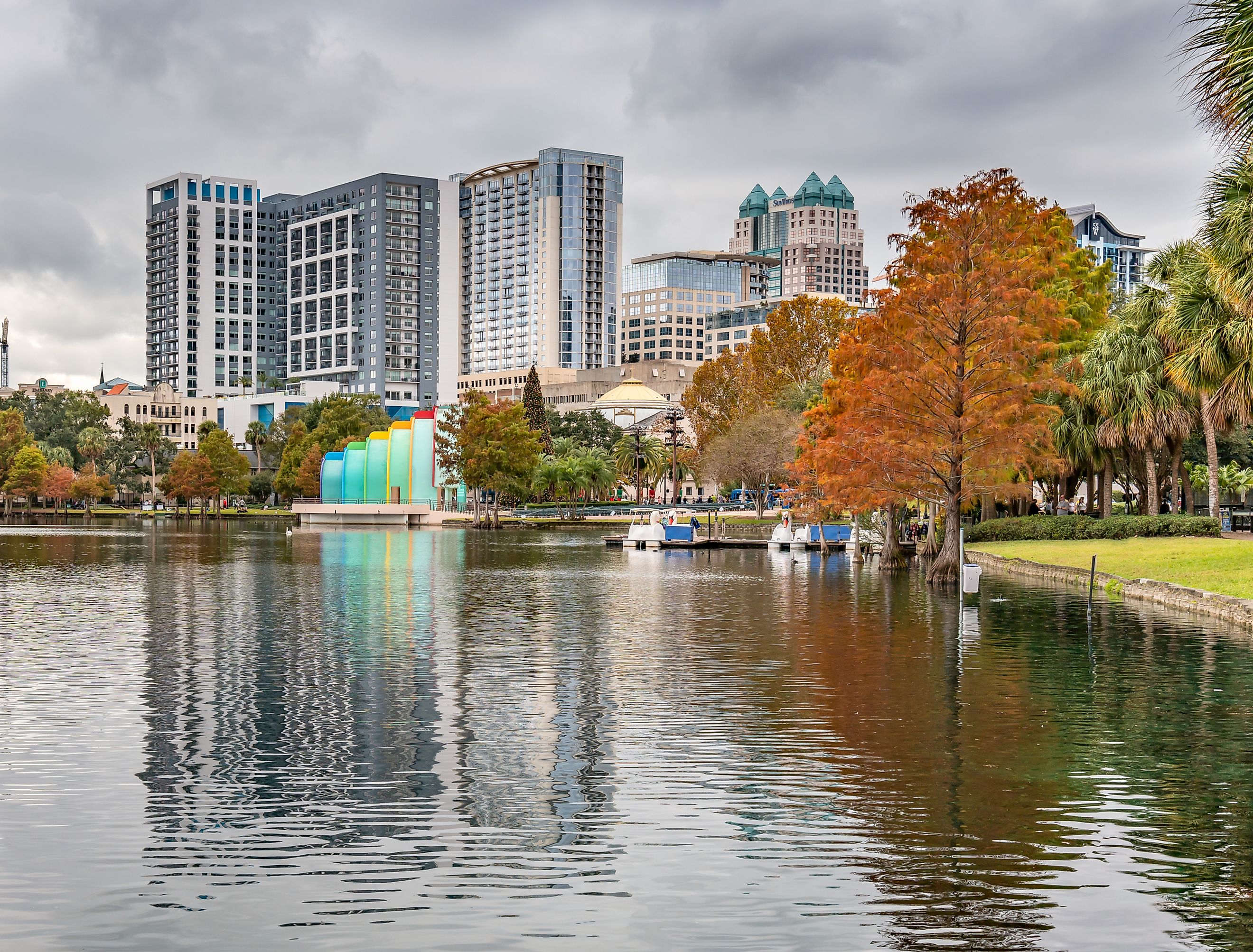 Eola Lake Park with vibrant autumn fall colors, Downtown Orlando. Editorial credit: Paula Montenegro Stock via shutterstock