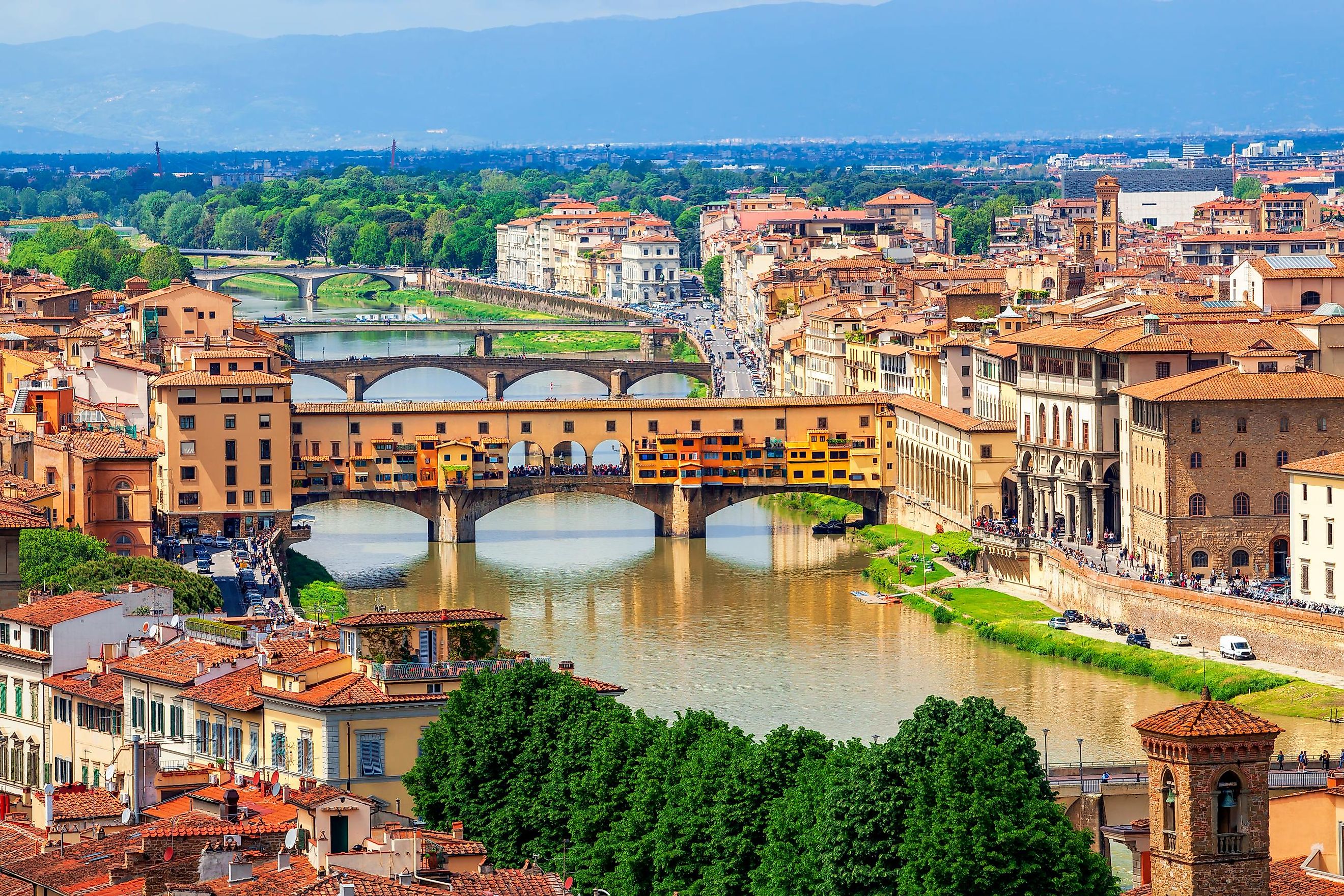 Panoramic view of medieval stone bridge Ponte Vecchio over the Arno River.