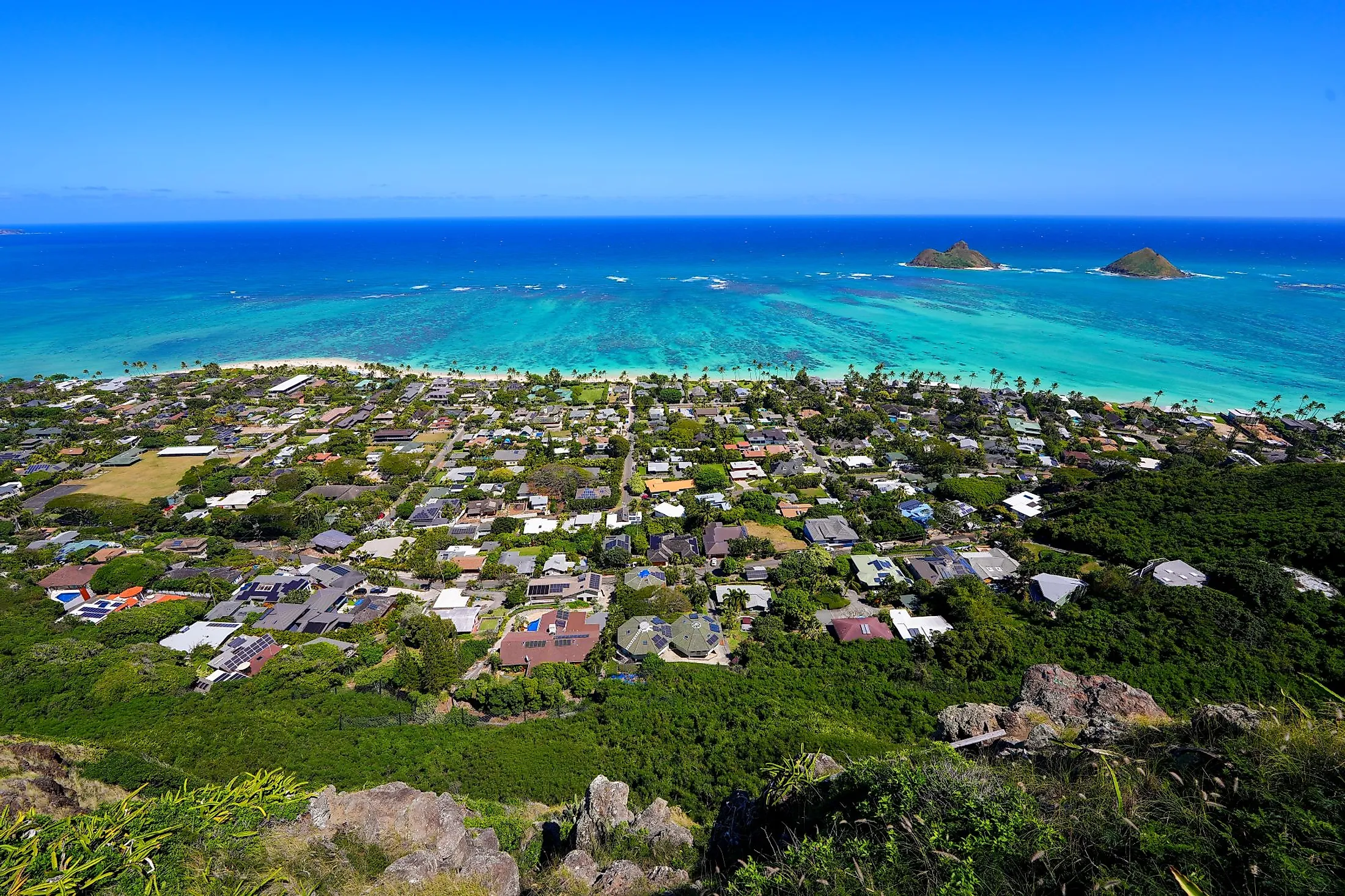 Oceanfront neighborhood of Lanikai Beach in Kailua, as seen from the Lanikai Pillbox hike, on the eastern side of Oahu, Hawaii