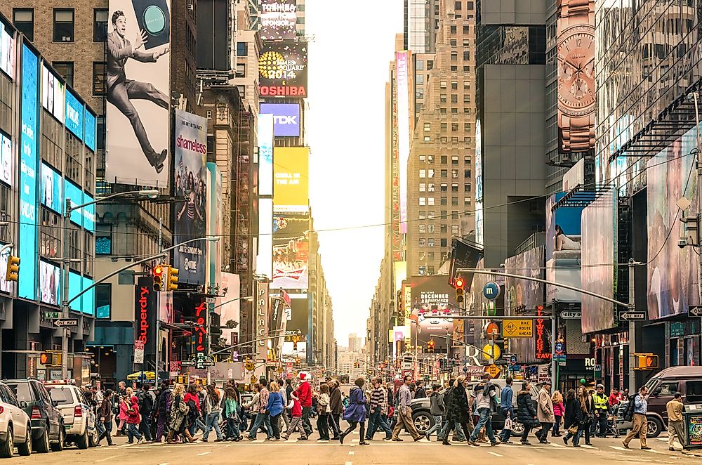 A crowded street in Manhattan, New York. Editorial credit: View Apart / Shutterstock.com.