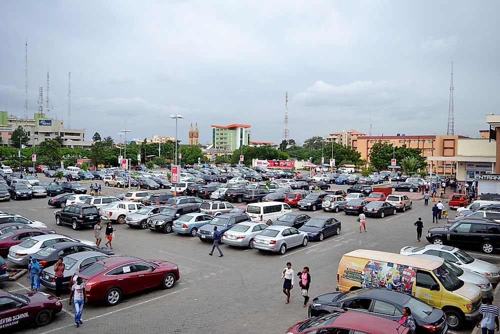 A full parking lot at Ikeja City Mall, one of the largest shopping malls in Nigeria. Editorial credit: Omnivisuals / Shutterstock.com.