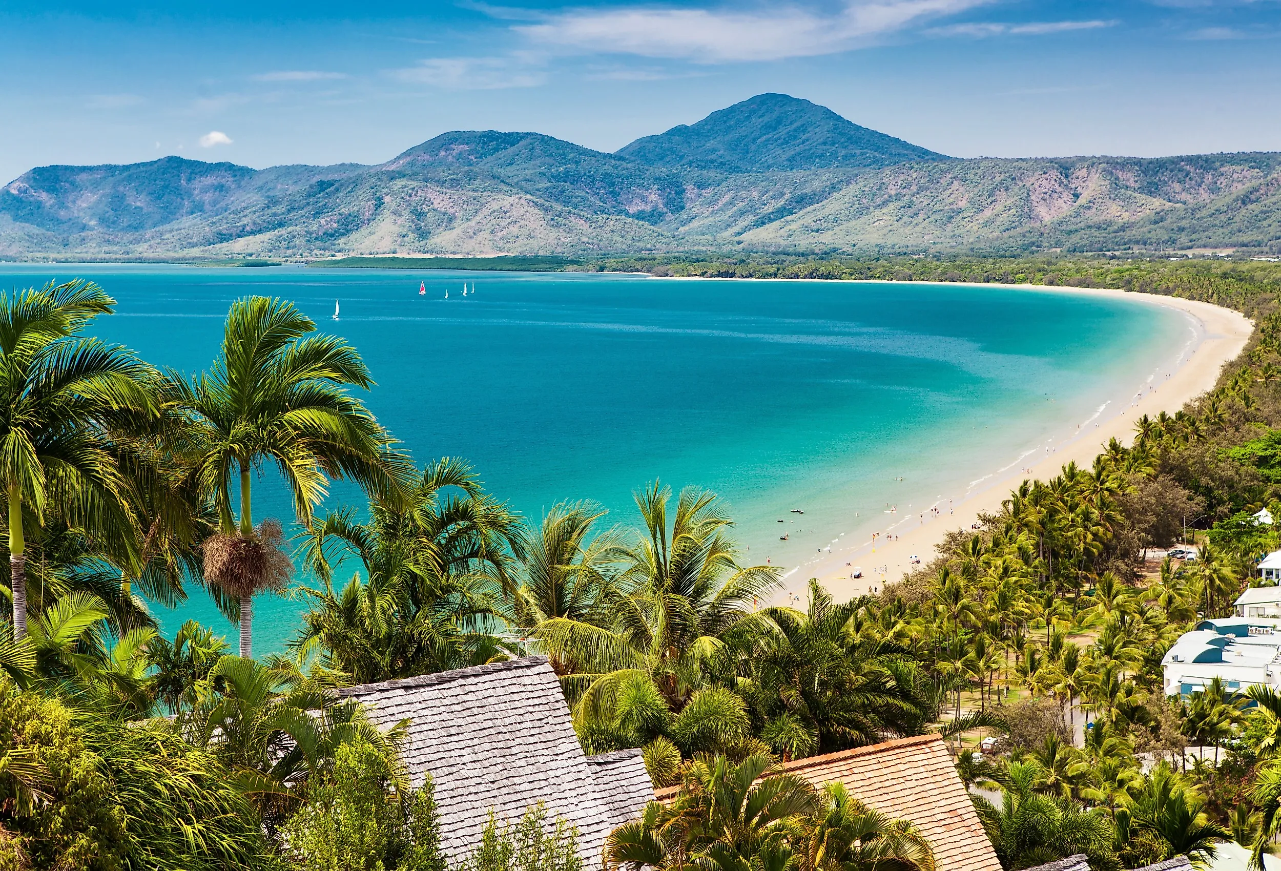 Port Douglas beach and ocean on sunny day, Queensland, Australia. Part of the Great Barrier Reef Drive.