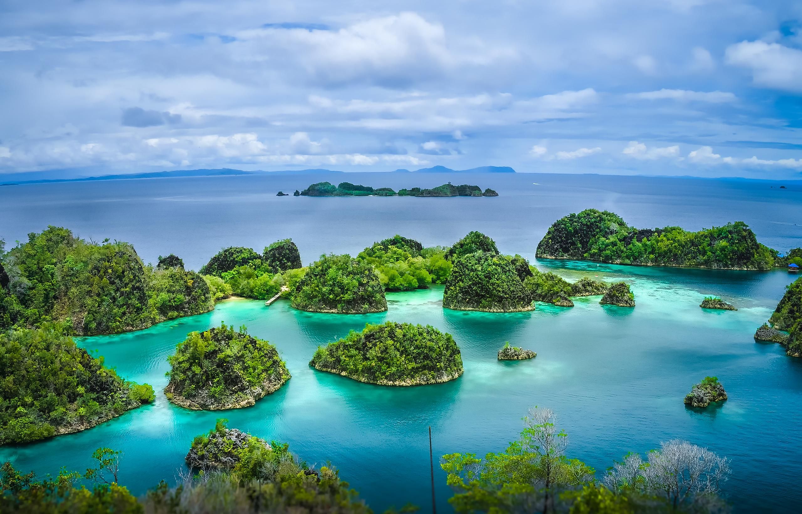Pianemo Islands, Blue Lagoon with Green Rockes, Raja Ampat, West Papua. Indonesia.