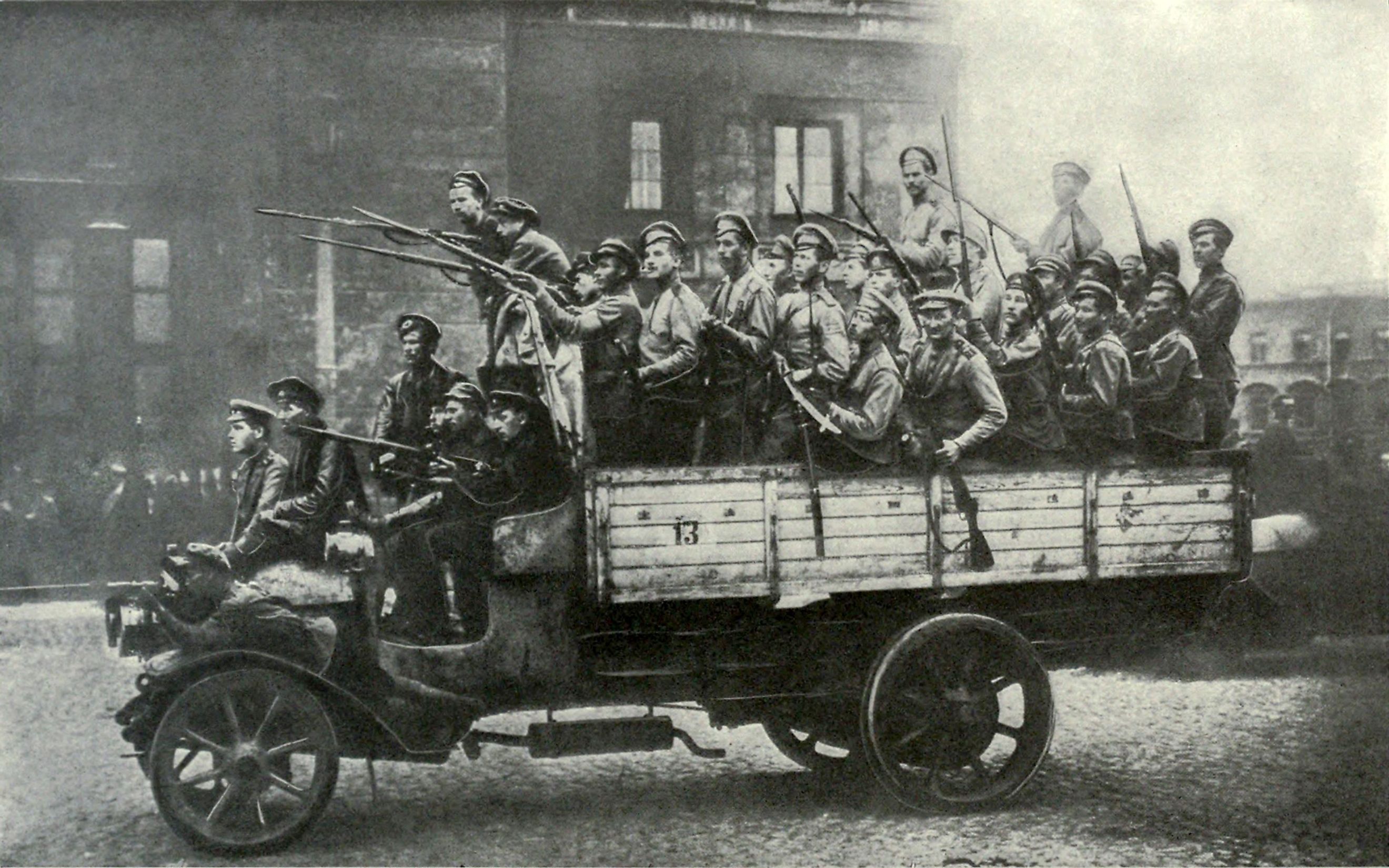 Truckload of excited soldiers during Russian Revolution. St. Petersburg, 1917.