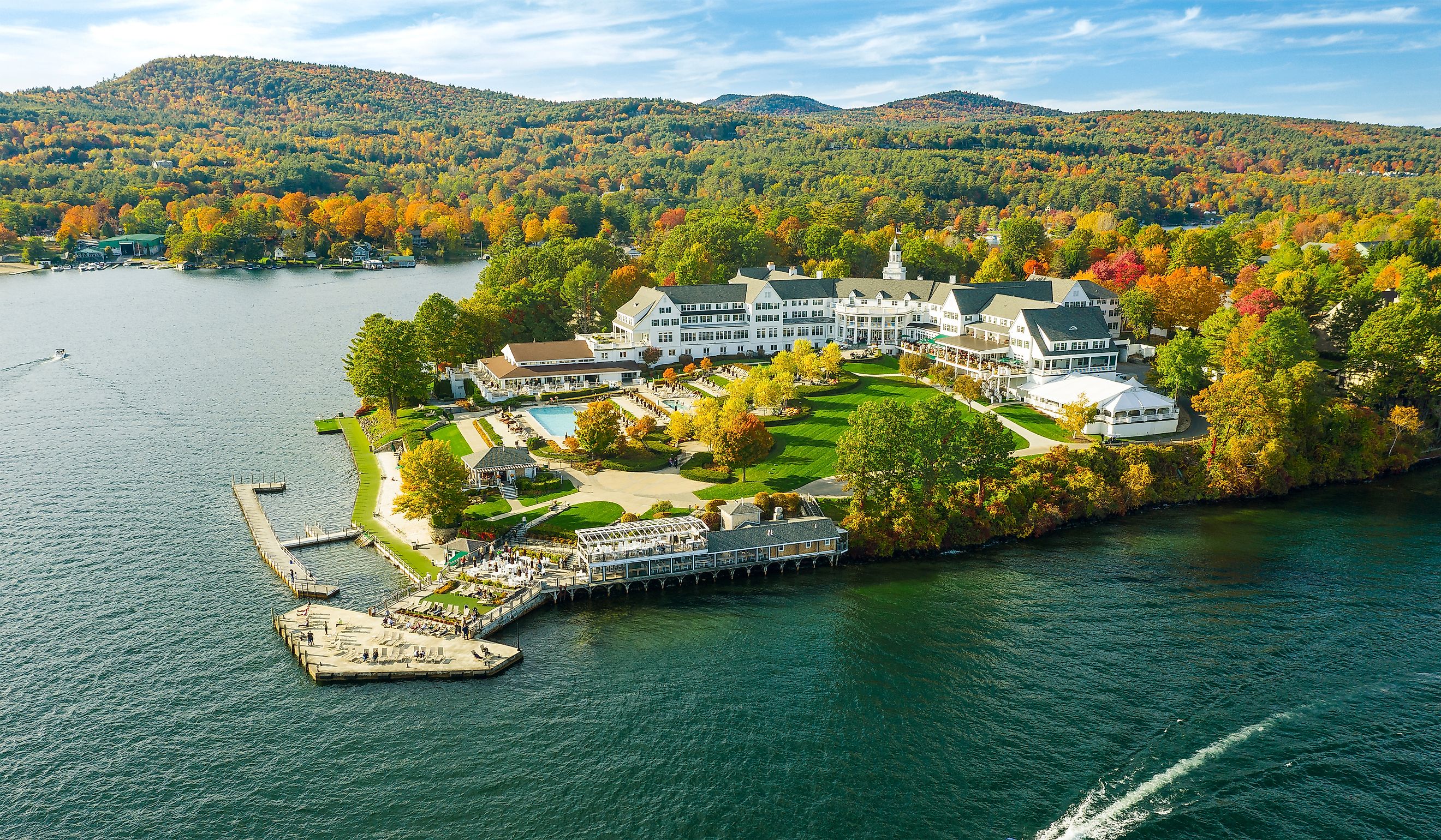 Fall foliage by Lake George at sunset, captured from a drone.