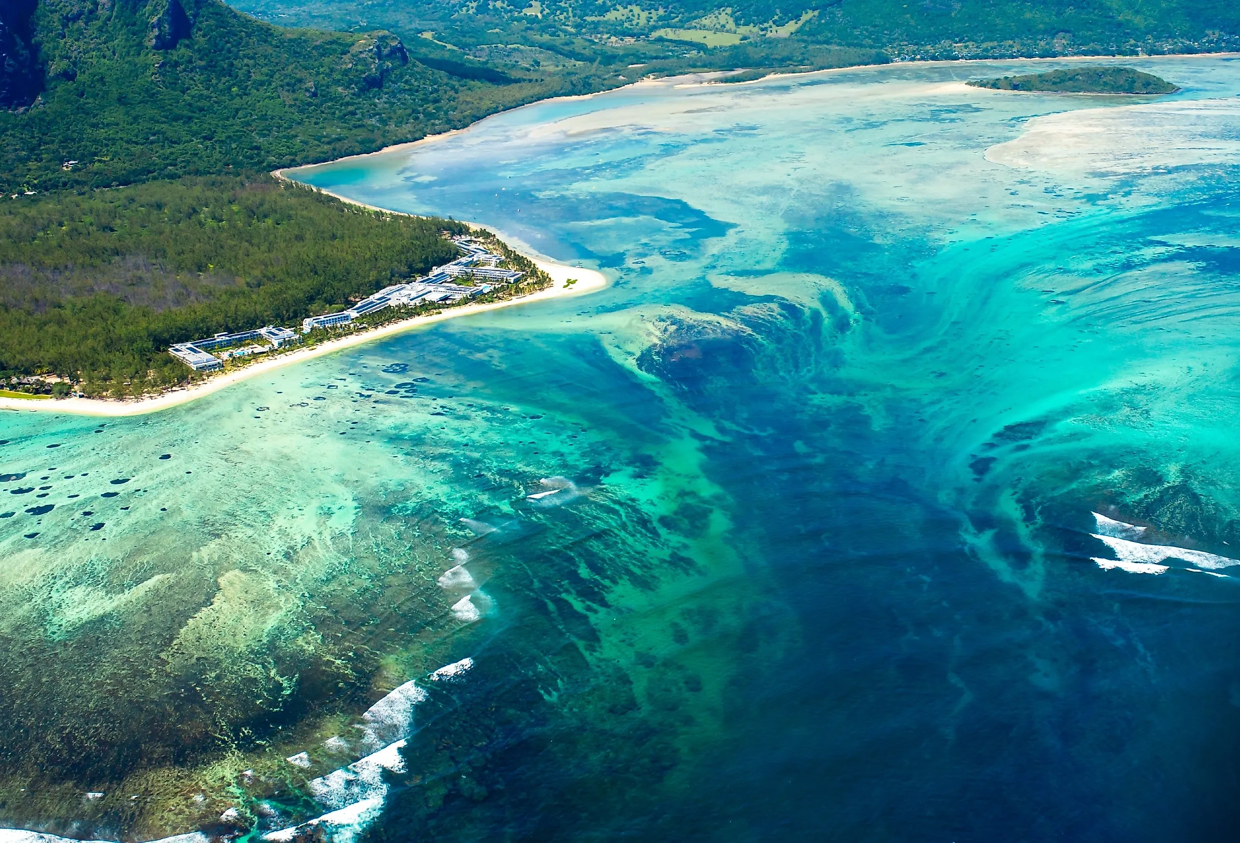An underwater waterfall off the coast of Mauritius, which is really an optical illusion.