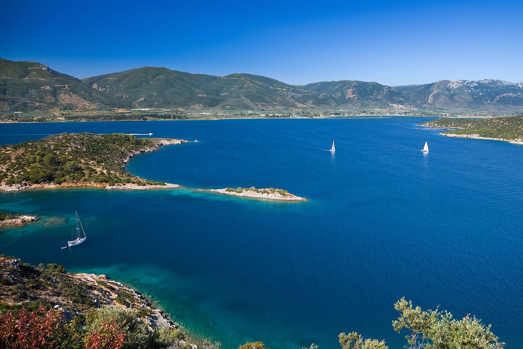 Yachts in Aegean sea near Poros, Greece. Image credit: S.Borisov/Shutterstock.com