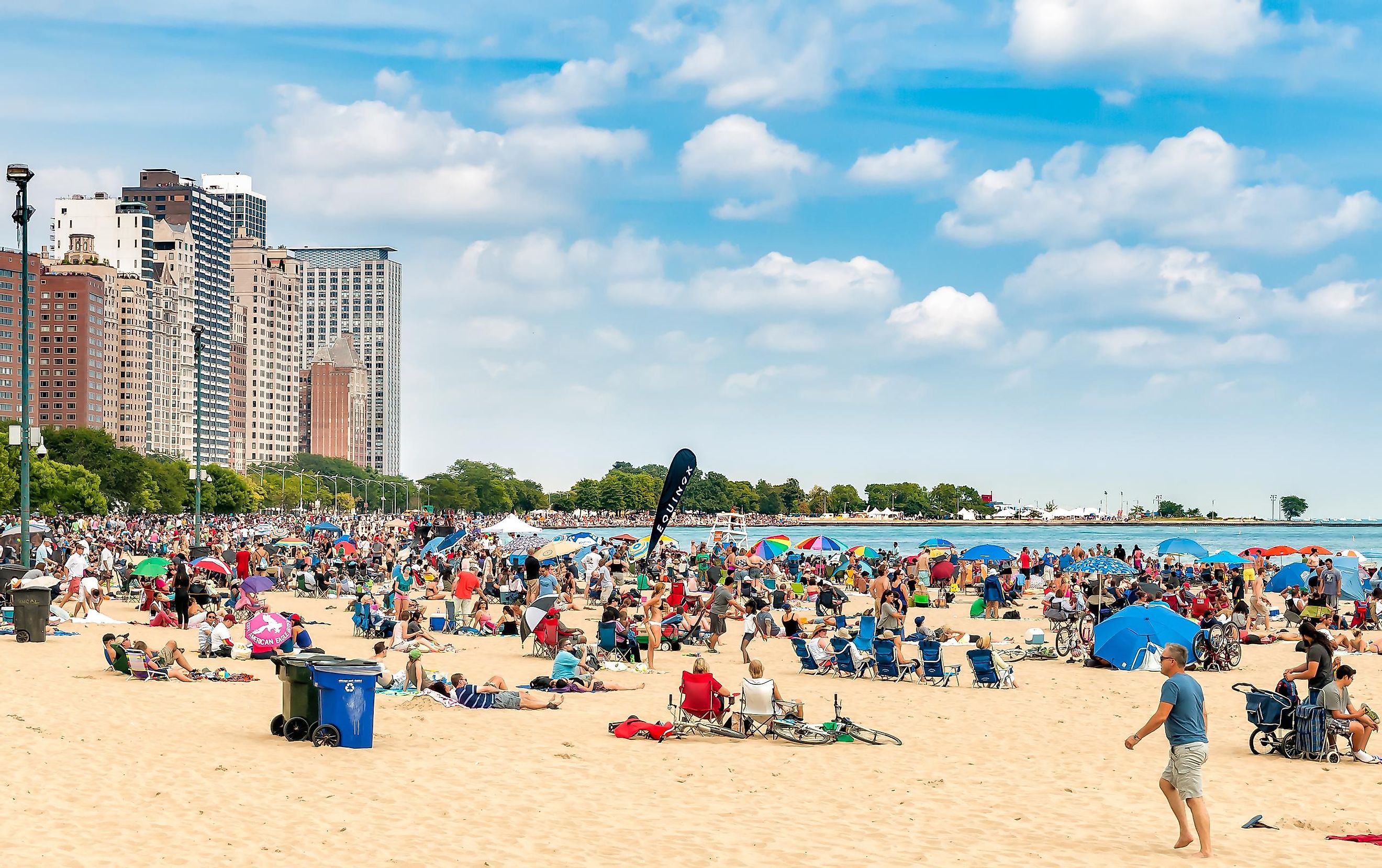 People enjoying summer time at the popular North Avenue Beach on the lake Michigan in Chicago