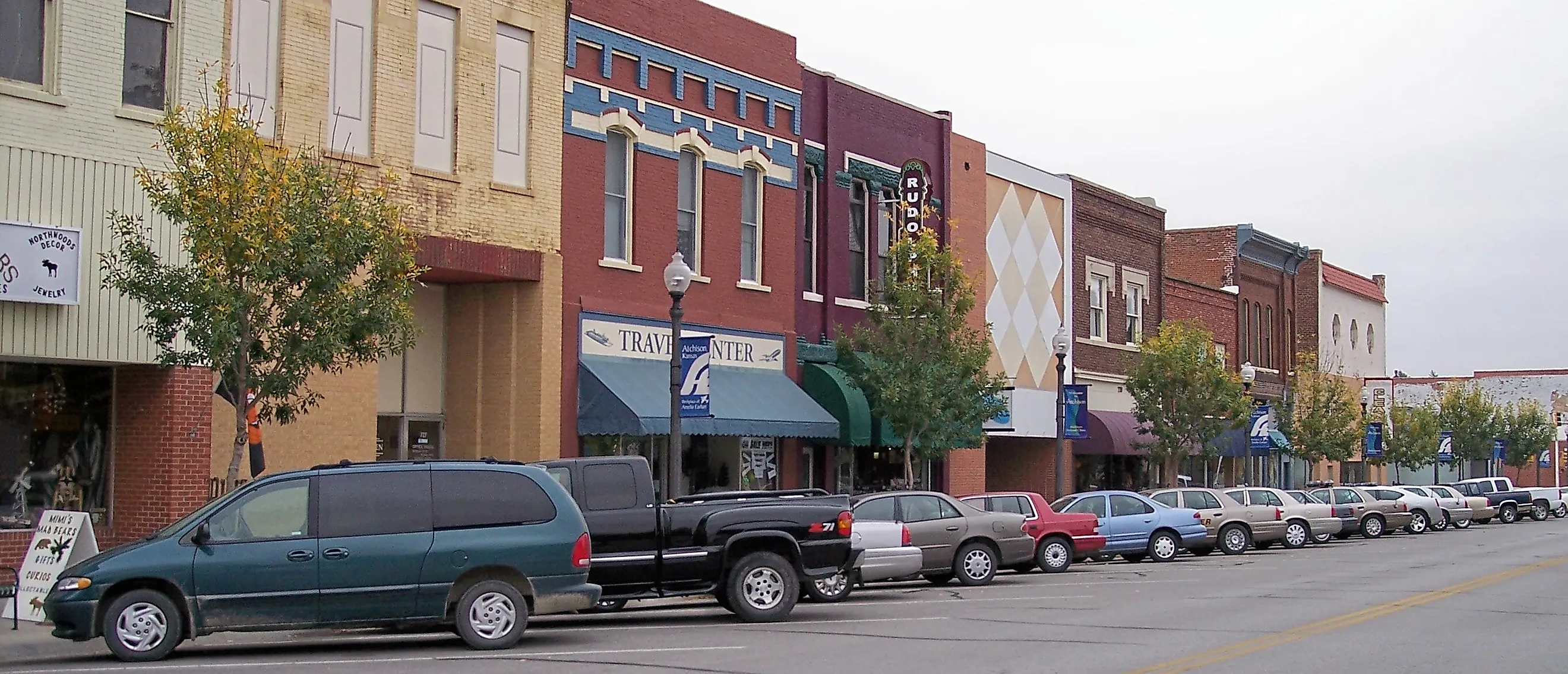 Brick buildings along a street in downtown Atchison, Kansas. Editorial credit: Tim Kiser - Self-photographed, CC BY-SA 3.0, Wikimedia Commons.