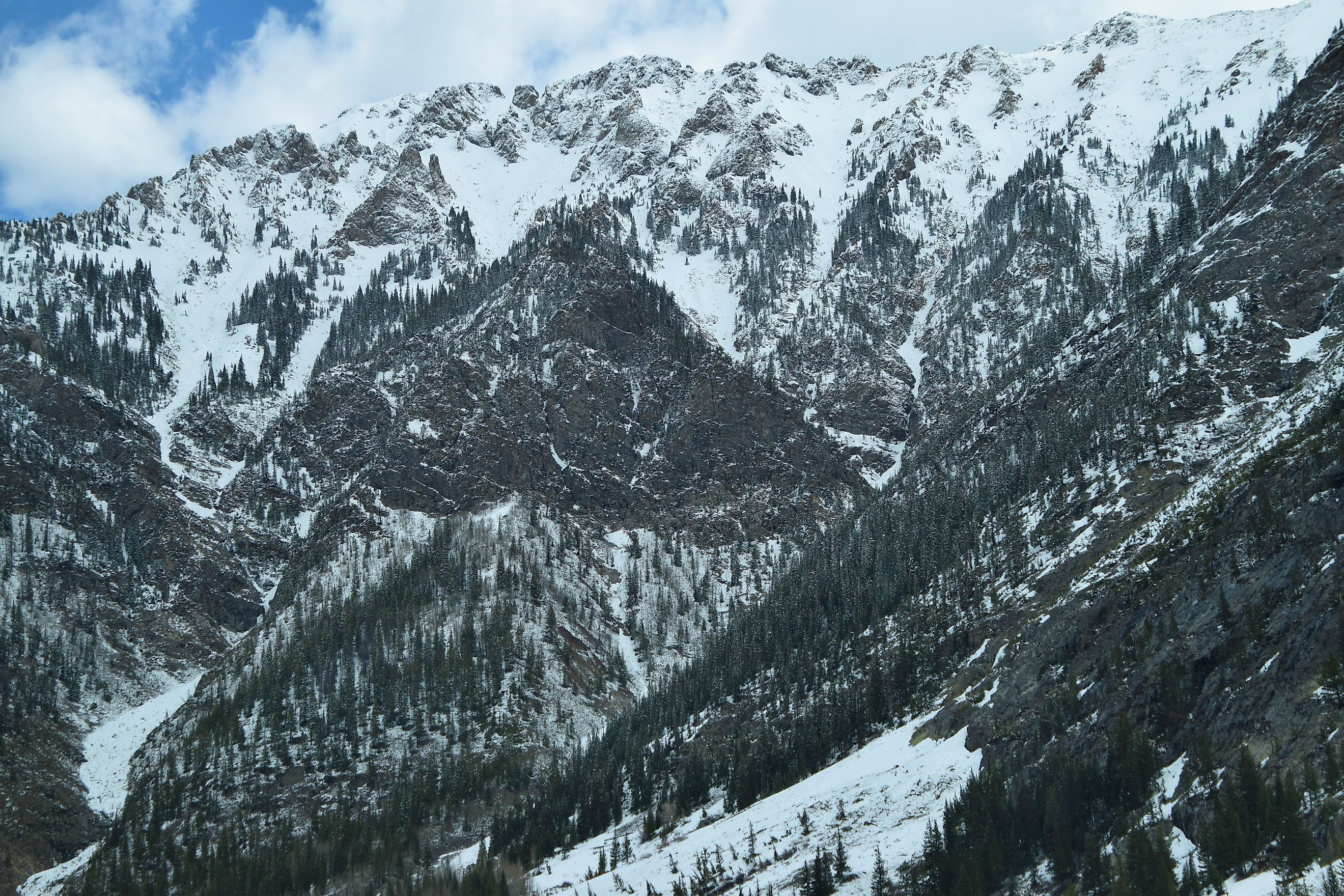 Cold barren snowy mountain peaks in Colorado Rocky Mountains.