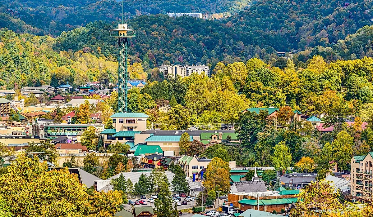 The gorgeous, tree-covered town Gatlinburg, Tennessee welcomes visitors year-round with open arms. 