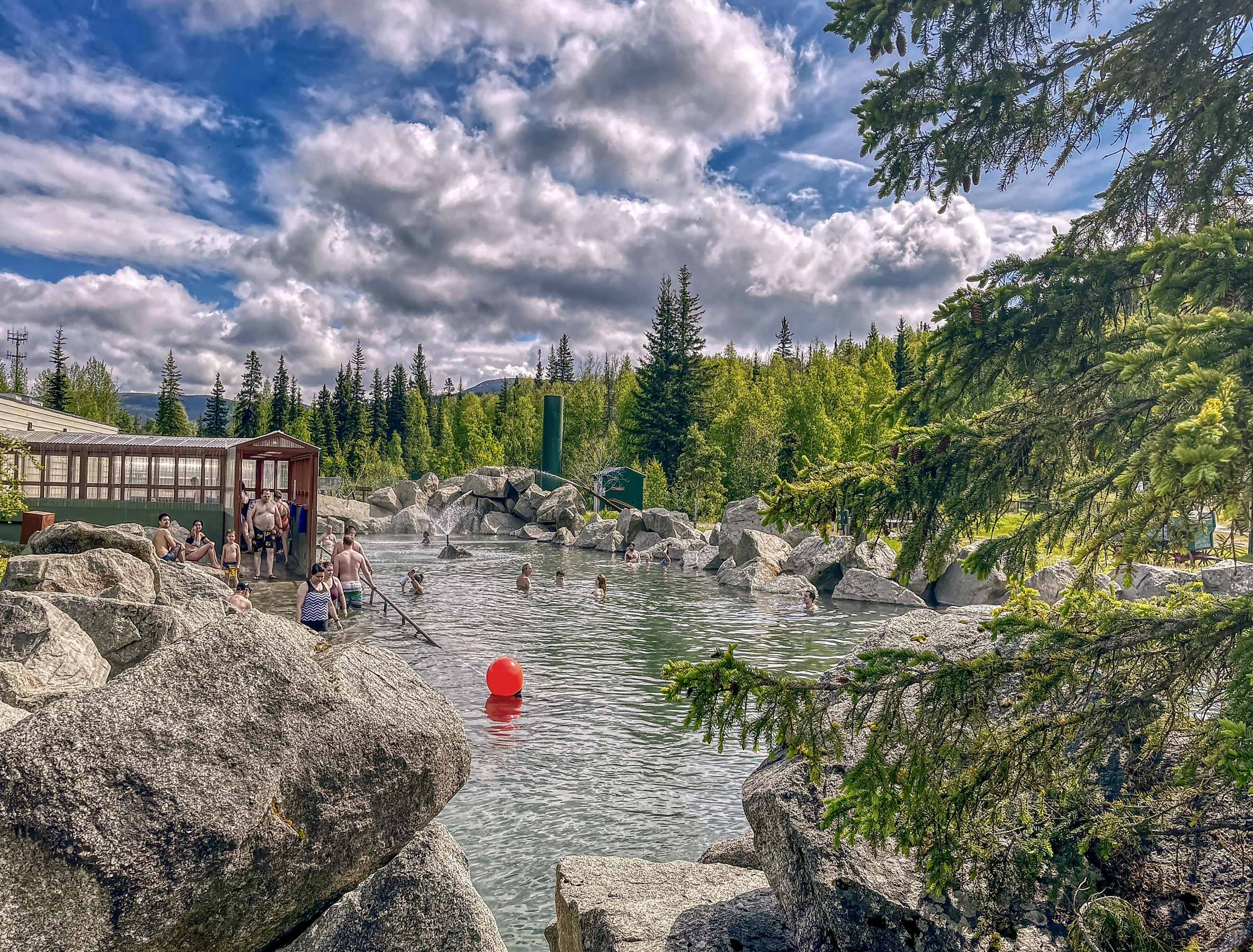 People relaxing in the Chena Hot Springs, Fairbanks, Alaska. Image credit Jacob Boomsma via shutterstock