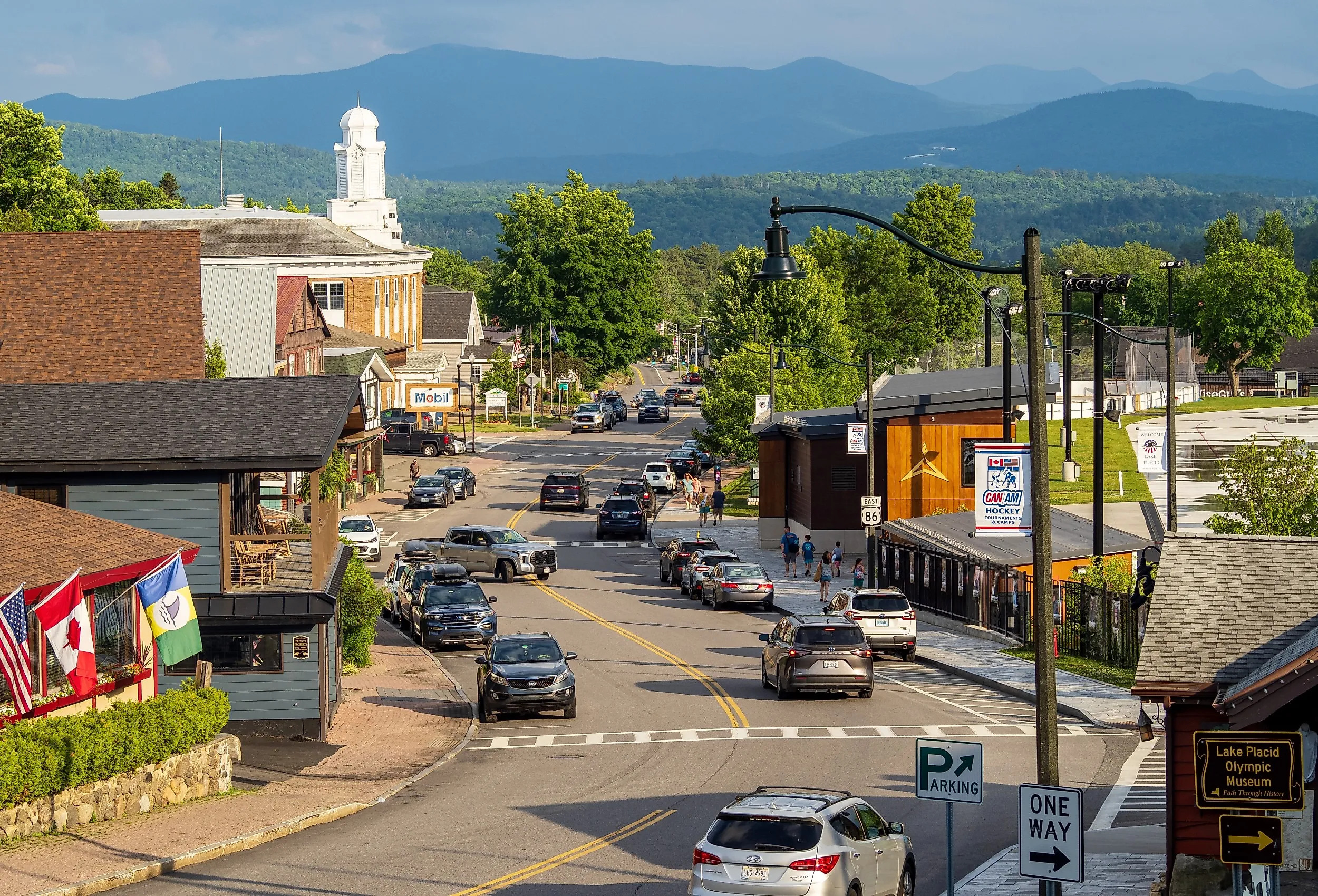 Main Street in downtown Lake Placid, Upstate New York with the mountains in the distance. Image credit Karlsson Photo via Shutterstock.