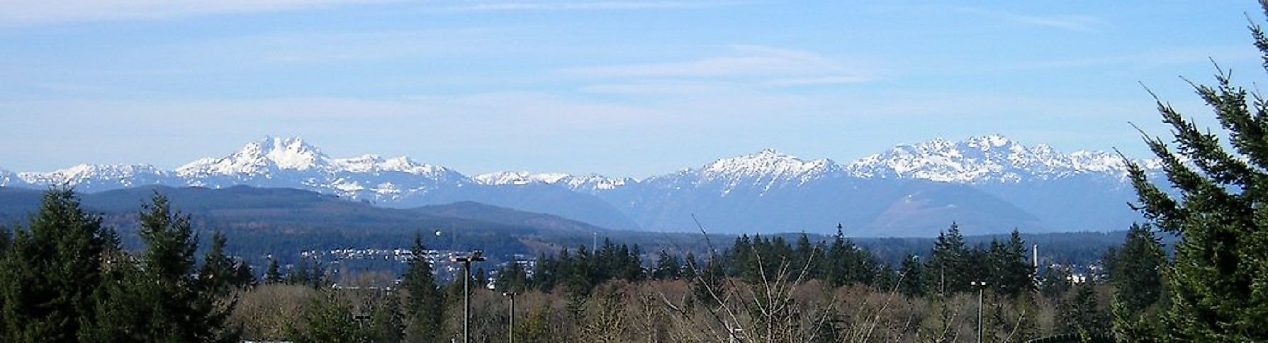 The Olympic Mountains stretch out across the horizon in the U.S. state of Washington.
