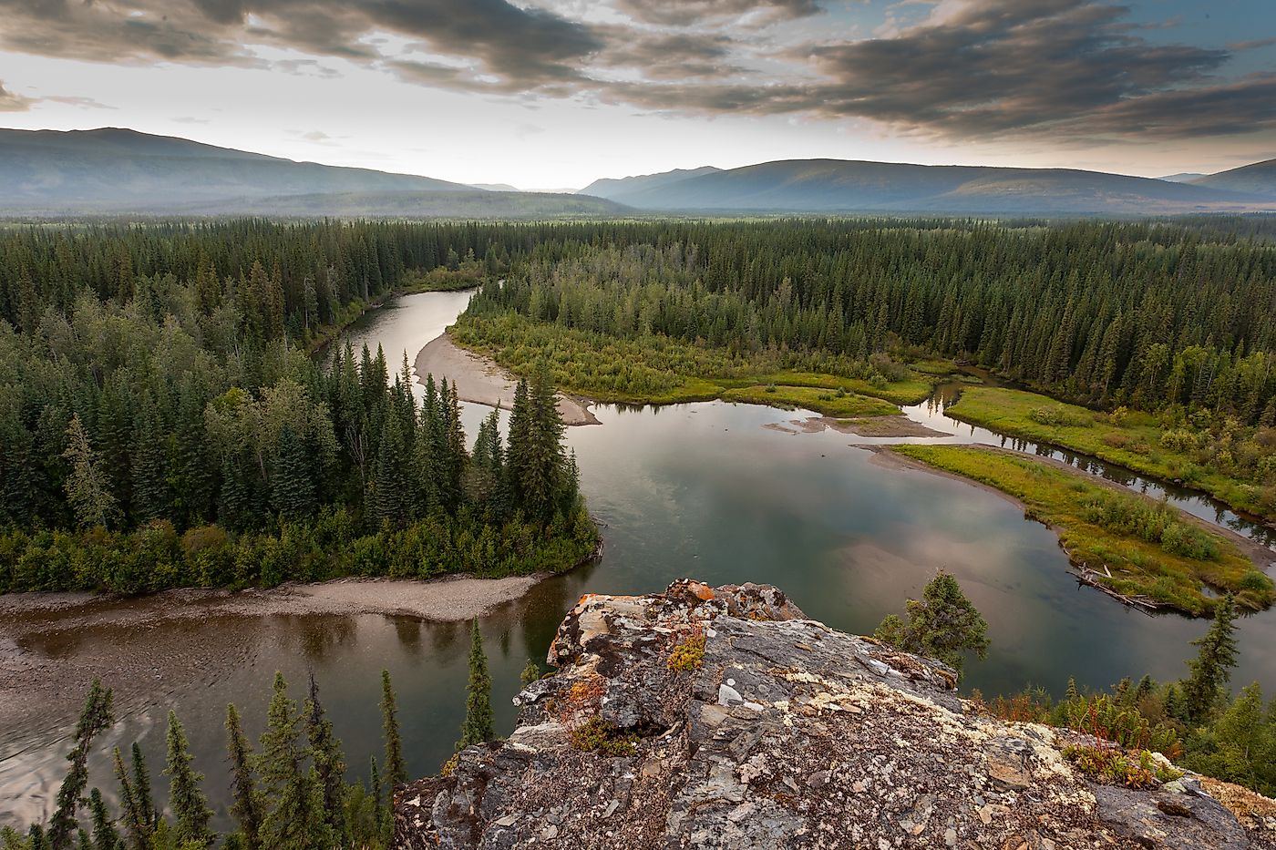 Boreal forest wilderness in beautiful McQuesten River valley in central Yukon Territory, Canada. Image credit: Pi-Lens/Shutterstock.com
