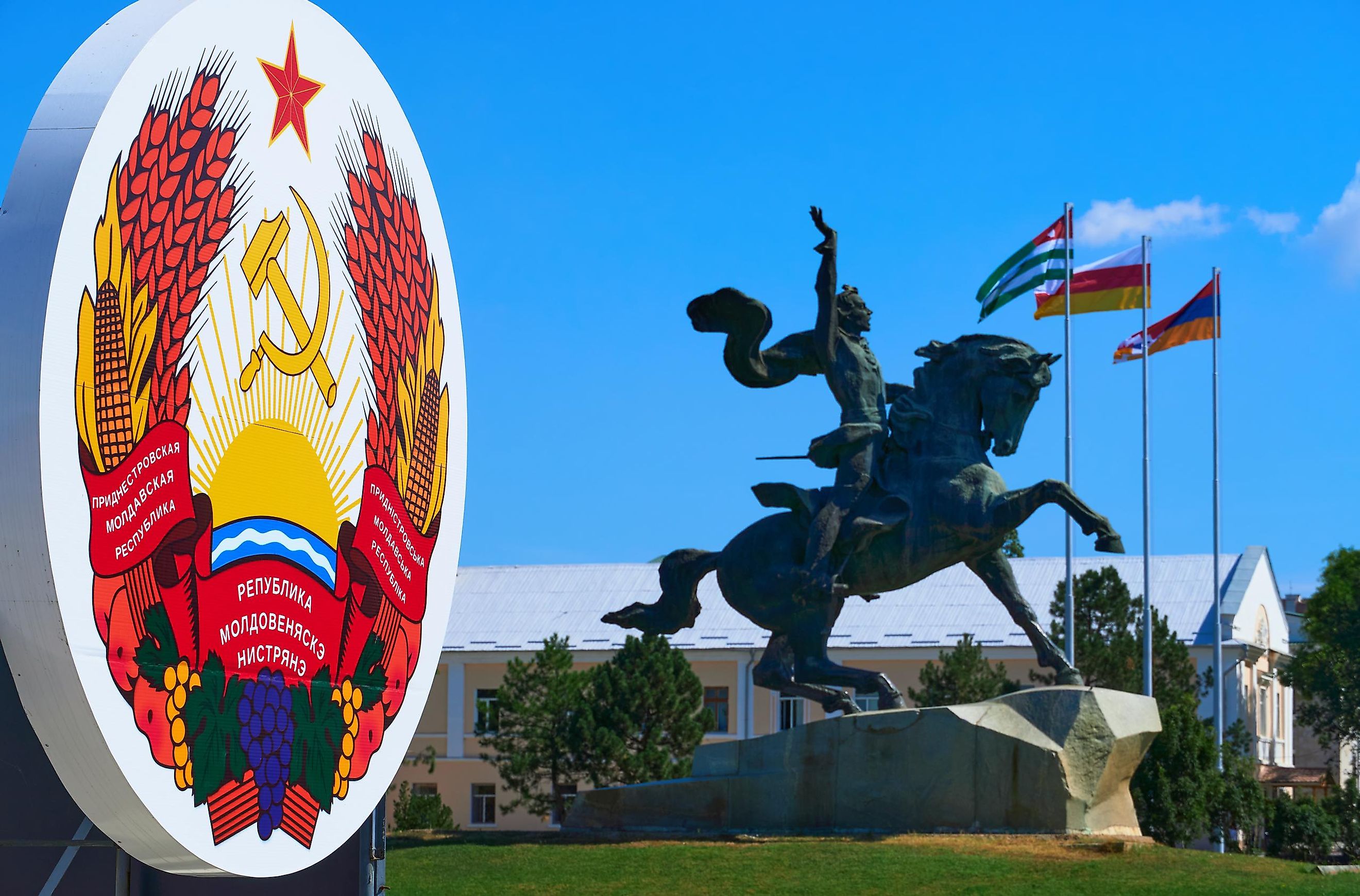 State emblem with the monument to Commander Suvorov in Tiraspol, Transnistria, Moldova.