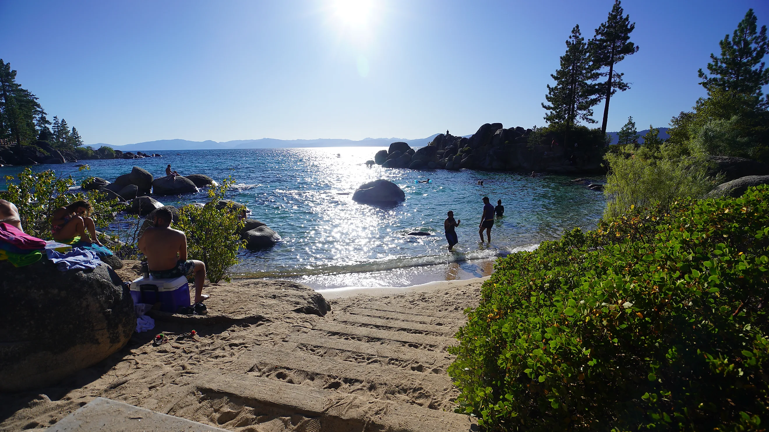 People enjoying the end of summer at the beach. Photo taken at Sand Harbor State Park in Lake Tahoe over the Labor Day weekend. 