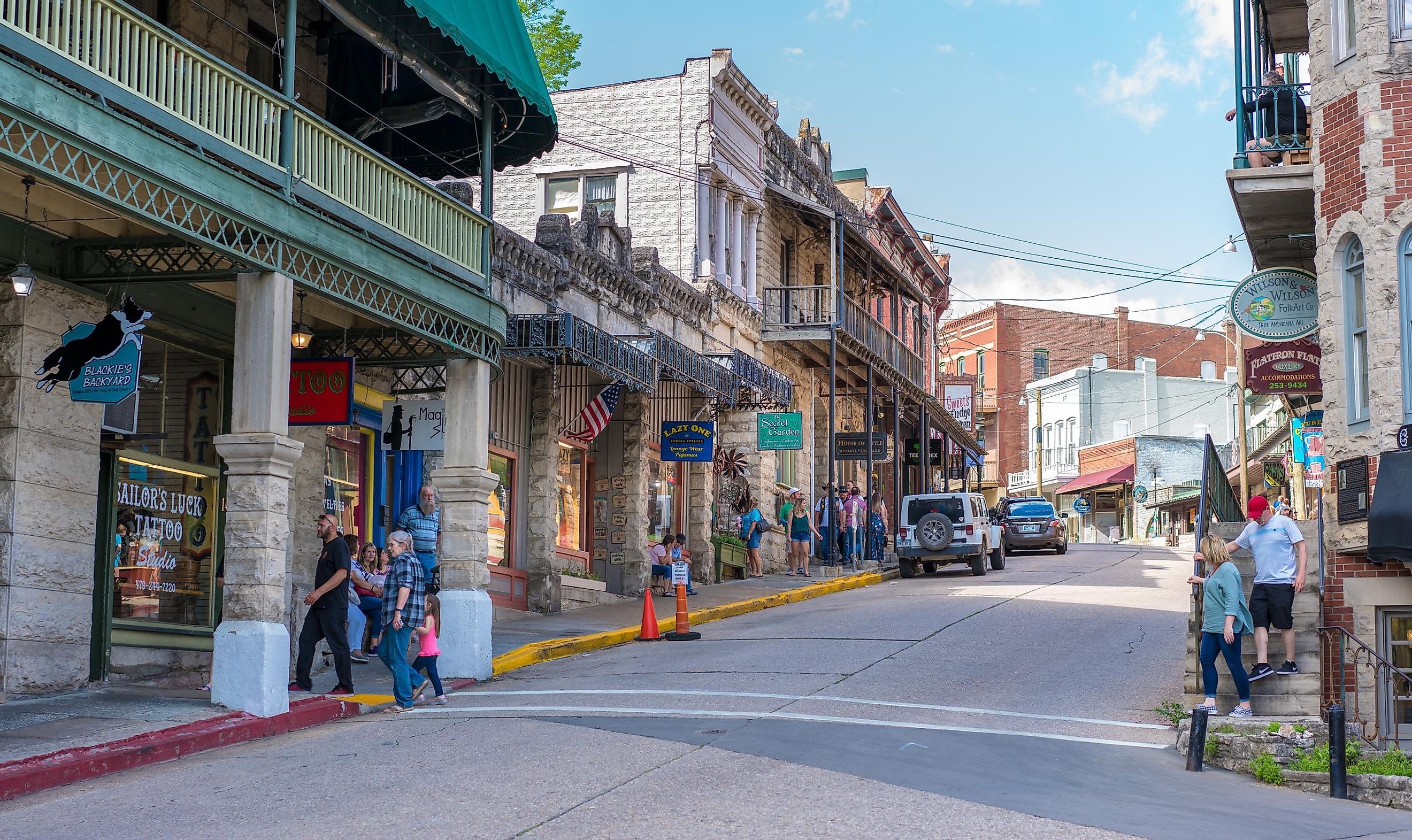 Charming street view of downtown Eureka Springs, Arkansas, known for its vibrant shops and bustling commerce, a must-visit destination in Northwest Arkansas. Editorial credit: shuttersv / Shutterstock.com