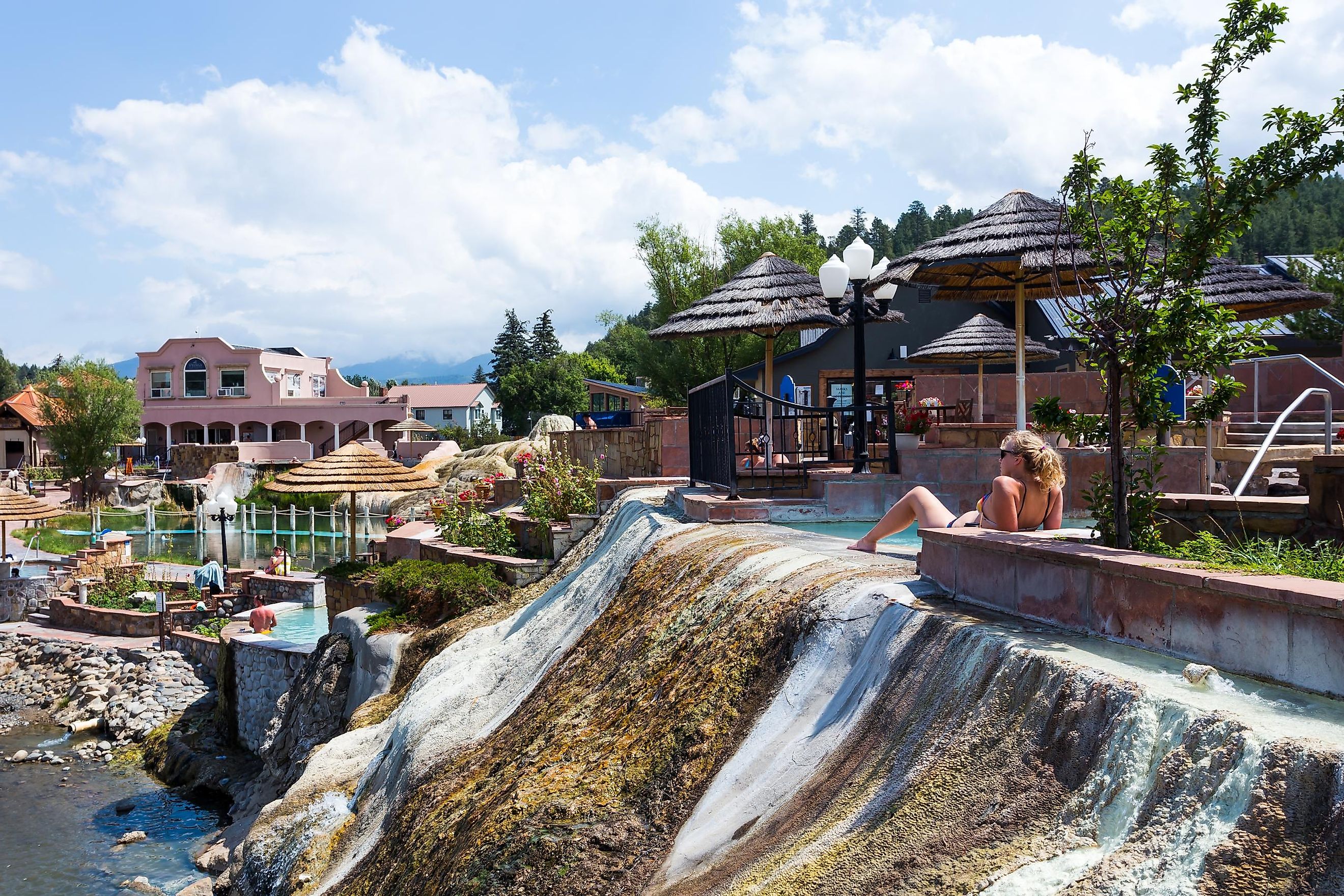 Pagosa Springs, Colorado, USA - August 19th, 2021: People relaxing in popular resort the Springs, San Juan river hot springs