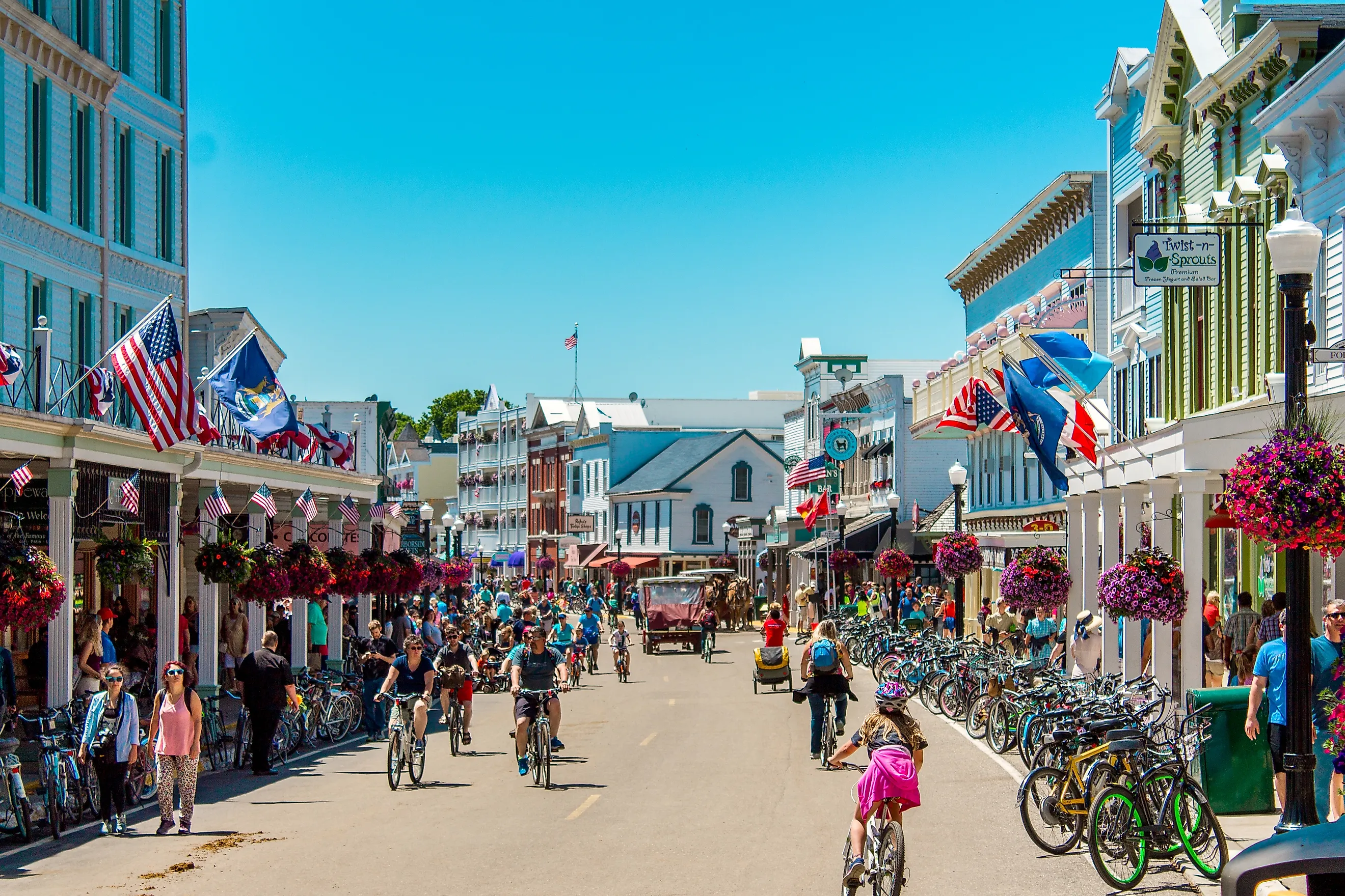 The busy streets of downtown Mackinac Island, Michigan. Image credit: Michael Deemer / Shutterstock.com.
