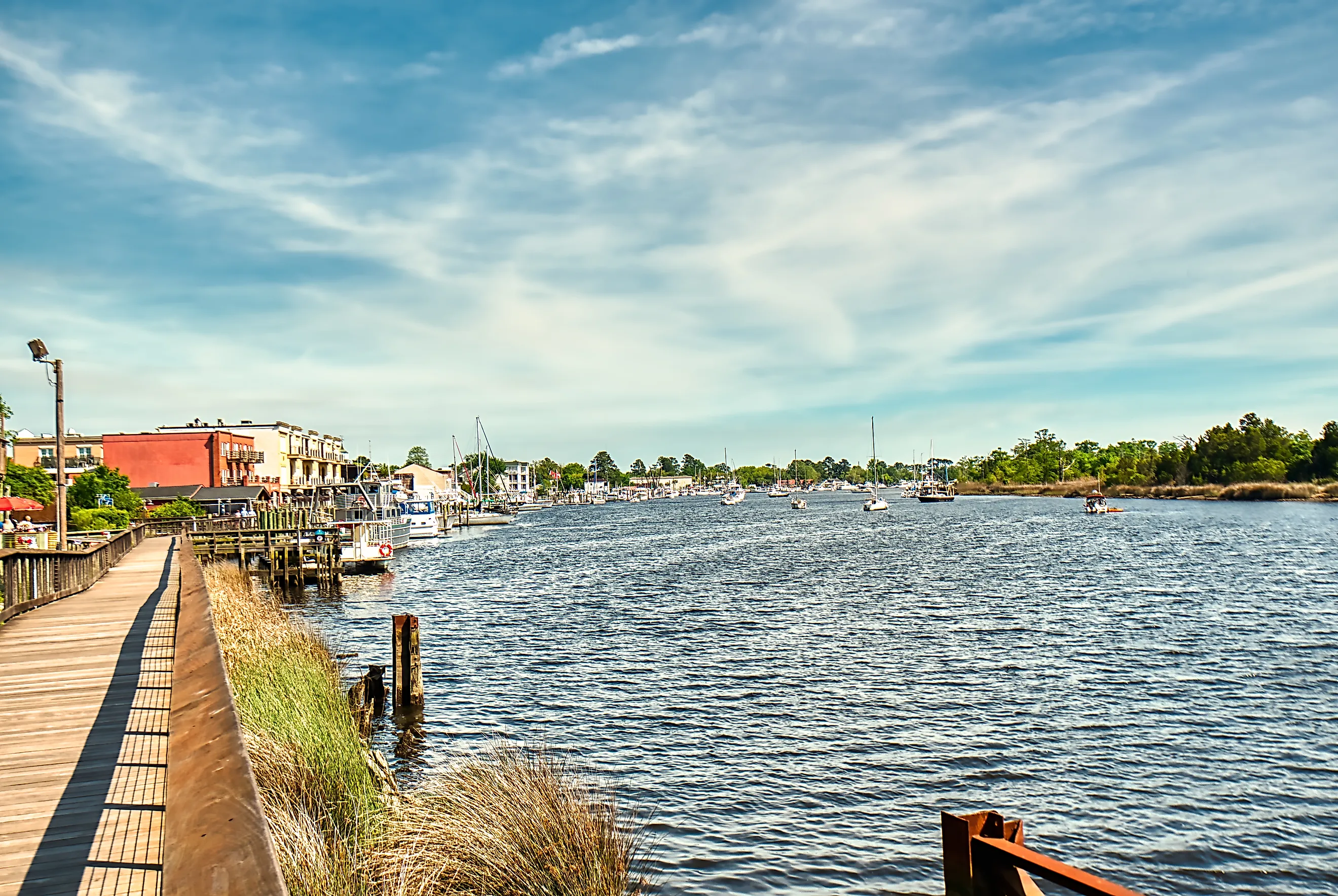 Boardwalk along the river in Georgetown, South Carolina, with the marina in the background.