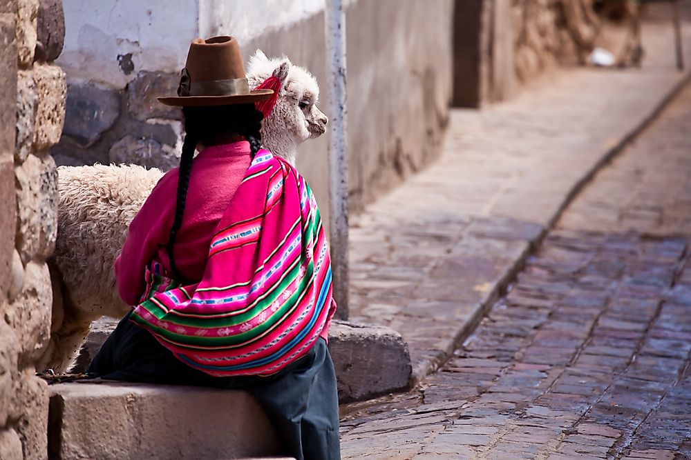 A woman in traditional clothes in Cuzco, Peru.