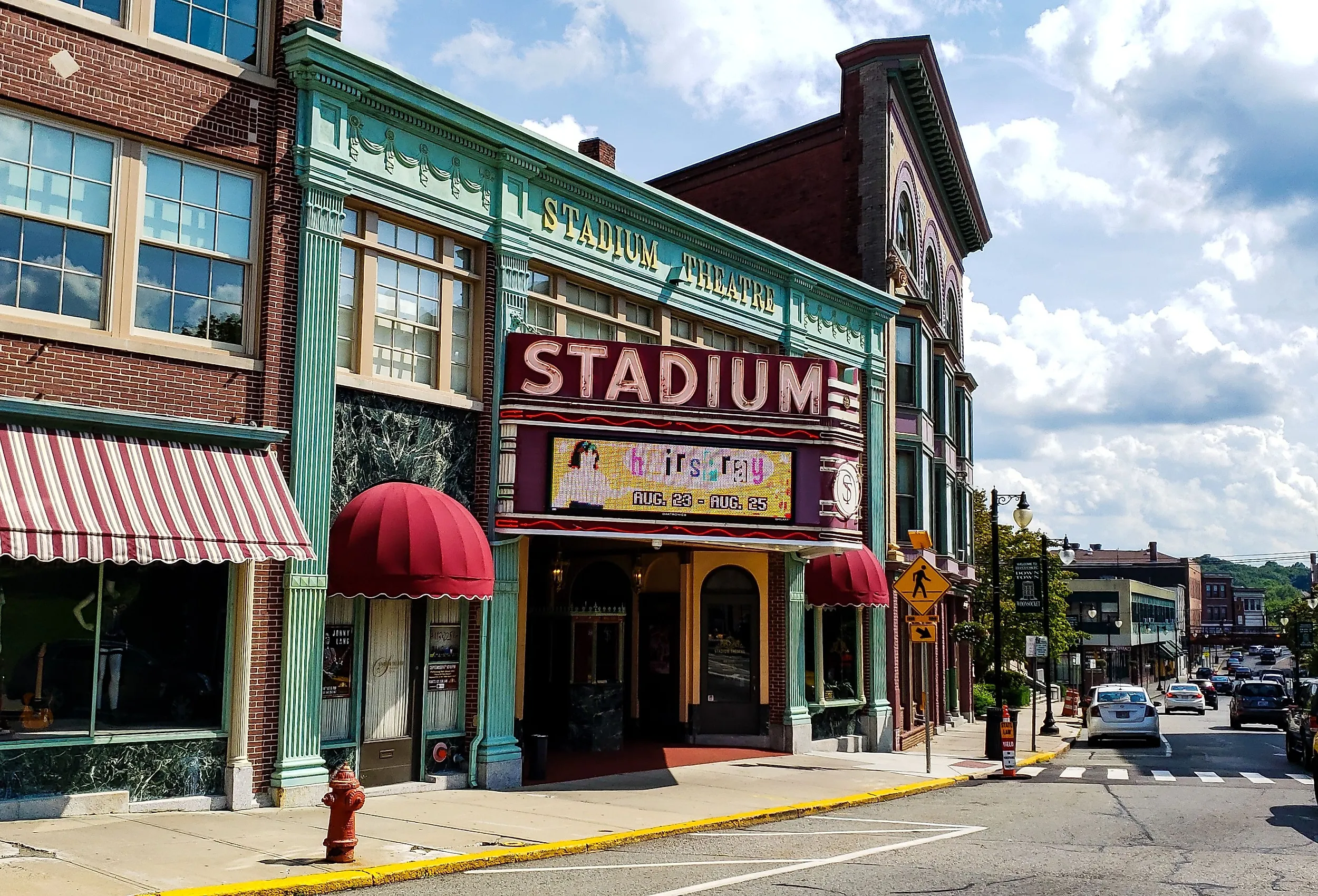 The Stadium Theatre, is an historic movie theater and concert venue and commercial building Woonsocket, Rhode Island. Editorial credit: Ramon Malave Photography / Shutterstock.com