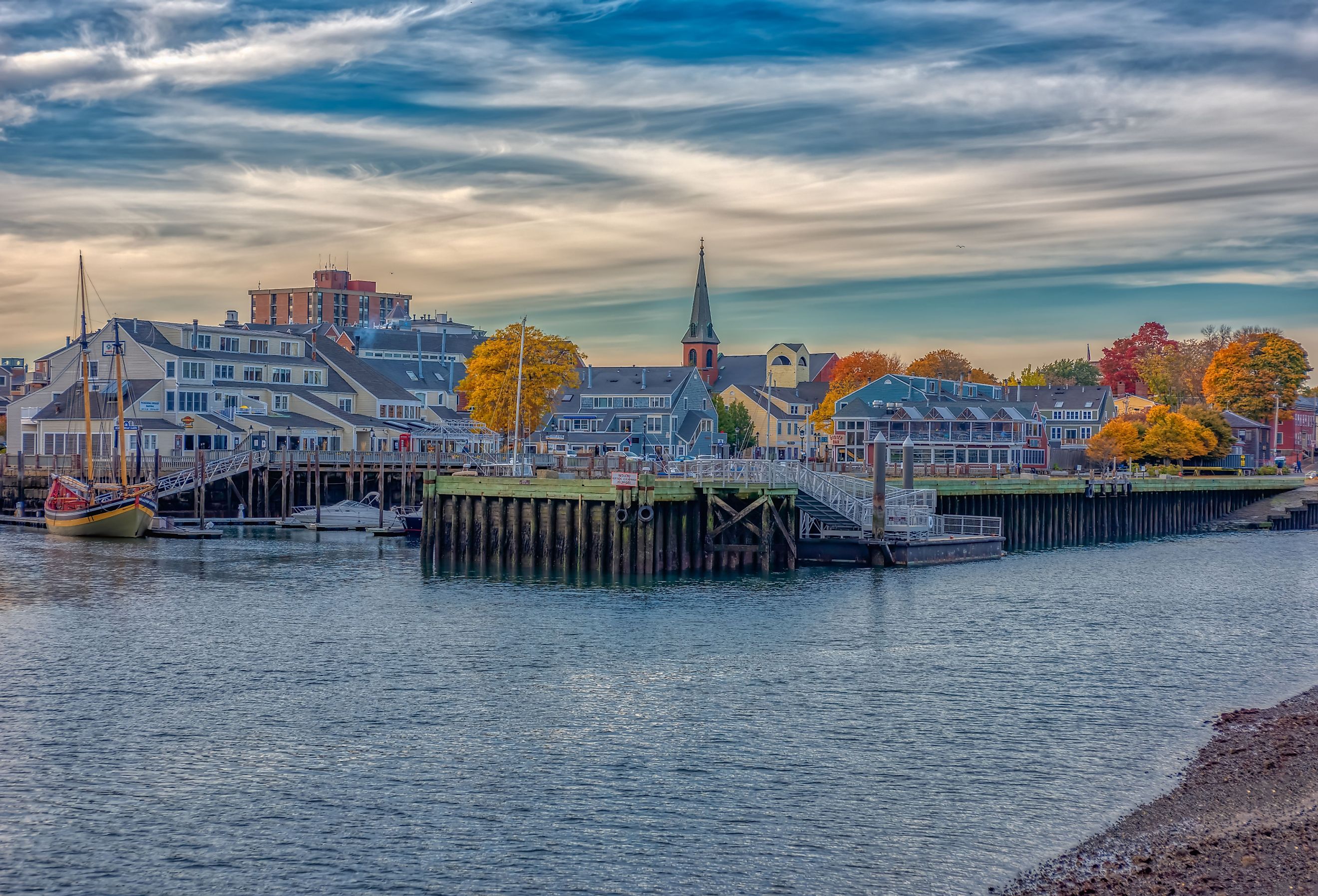 Pickering Wharf Marina Cityscape, water, boats, trees, fall colors, Salem, Massachusetts. Image credit Terry Kelly via Shutterstock