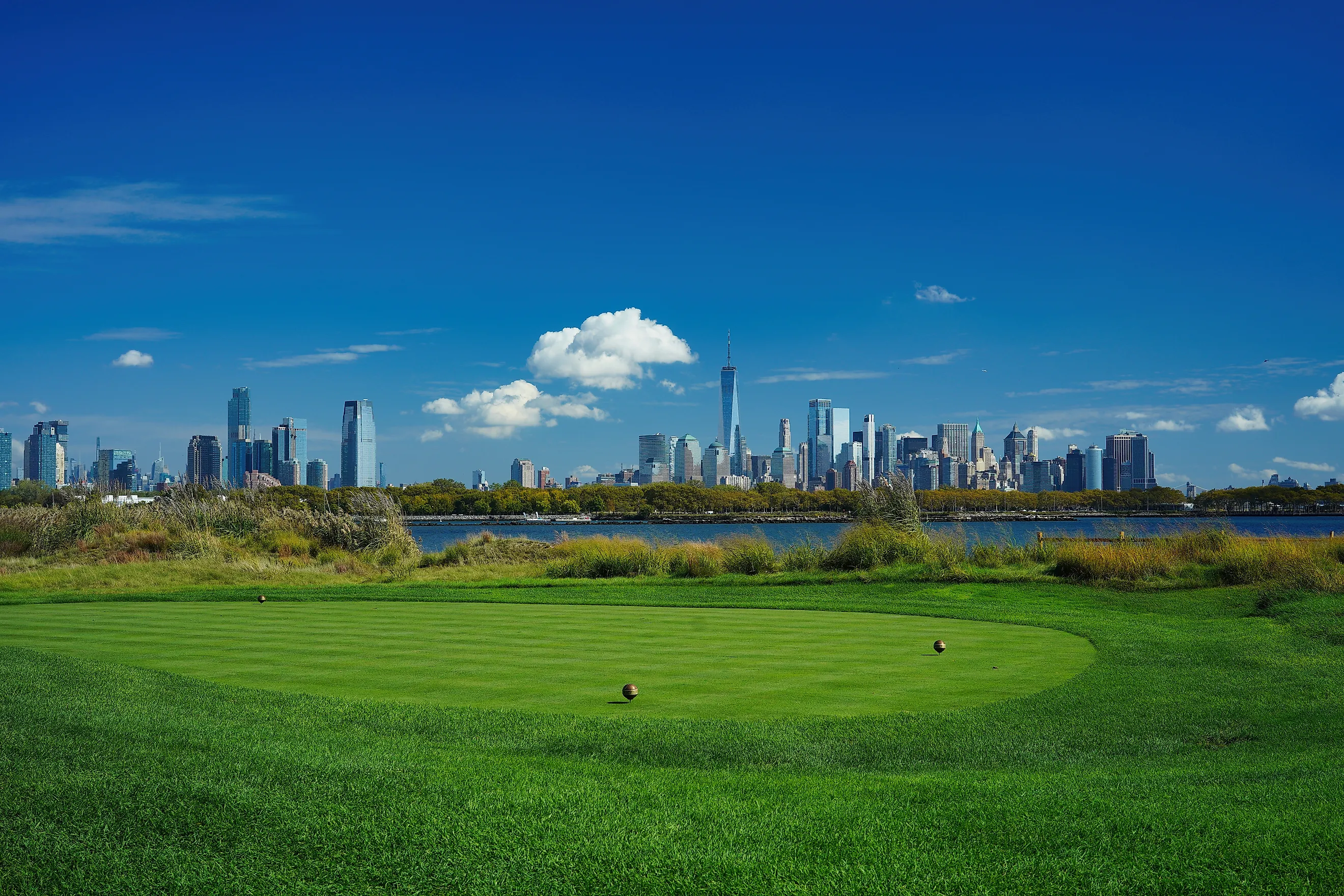Golfer hit sweeping driver after hitting golf ball down the fairway. Editorial credit: Photoongraphy via Shutterstock.com.