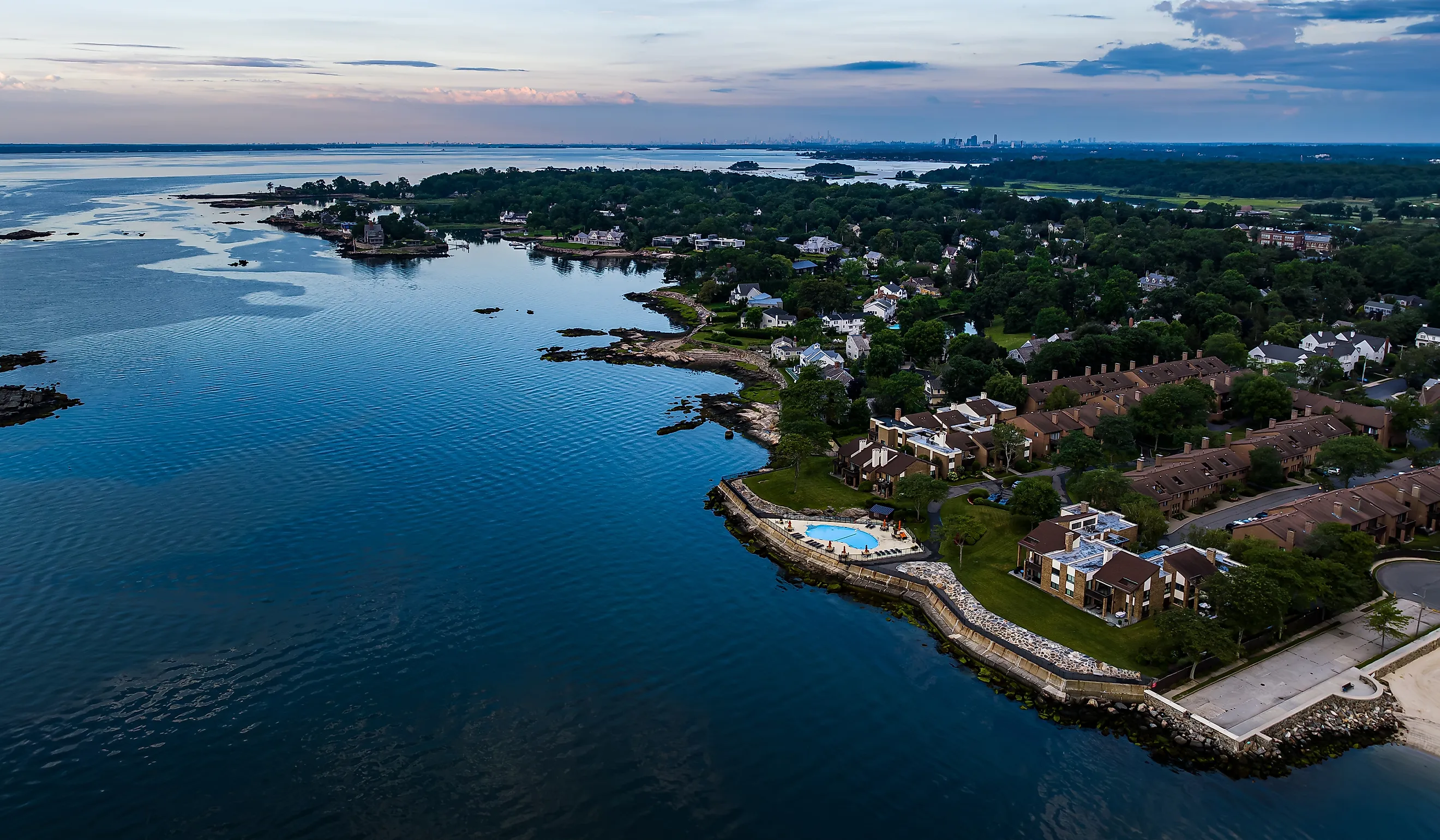 A high angle, aerial view over the calm waters of the Long Island Sound by Rye Beach, New York.