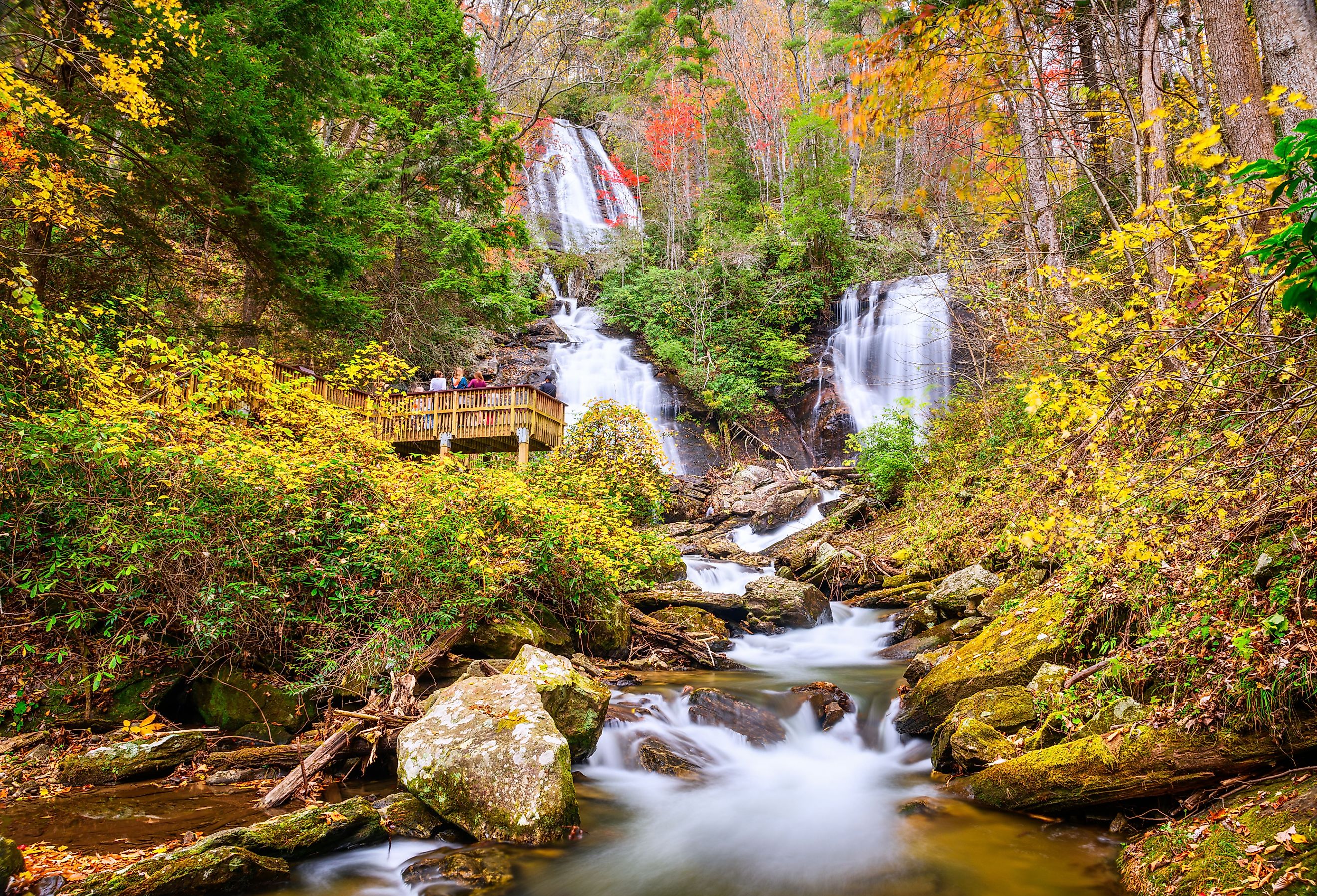 Anna Ruby Falls, Georgia, with tourists in autumn.