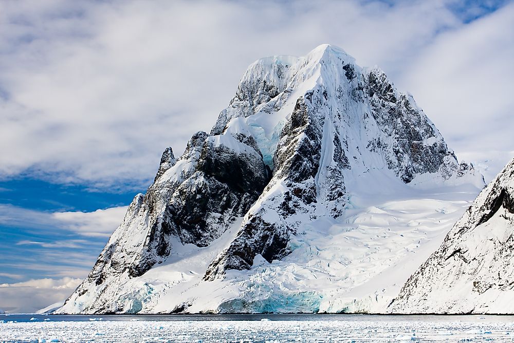 Snow appears white while glacier ice appears blue.